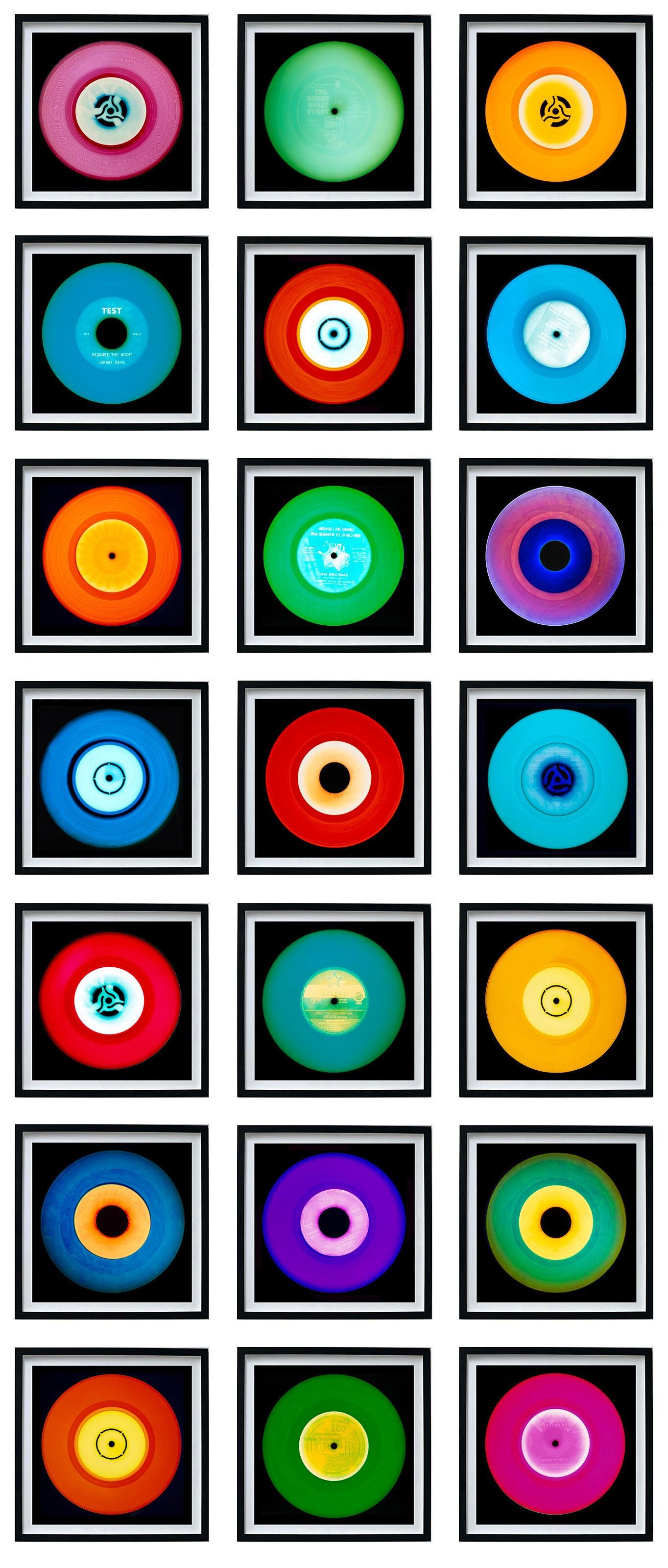 Heidler & Heeps Vinyl Collection Twenty-One Piece Multi-color Installation.
Acclaimed contemporary photographers, Richard Heeps and Natasha Heidler have collaborated to make this beautifully mesmerising collection. A celebration of the vinyl record