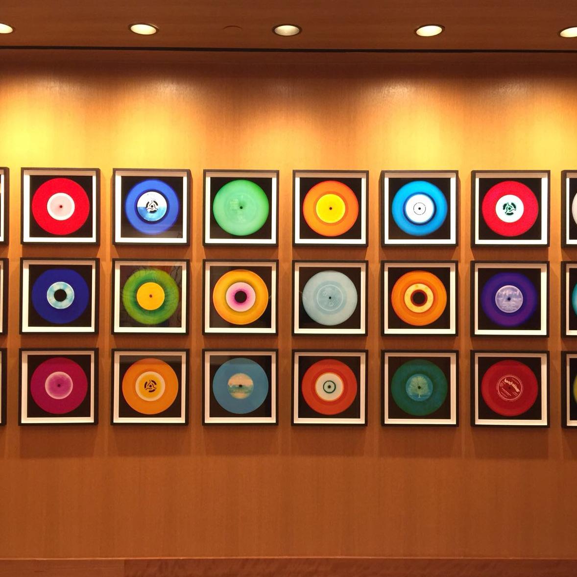 Heidler & Heeps Vinyl Collection Twenty-One Piece Multi-Color Installation.
Acclaimed contemporary photographers, Richard Heeps and Natasha Heidler have collaborated to make this beautifully mesmerising collection. A celebration of the vinyl record