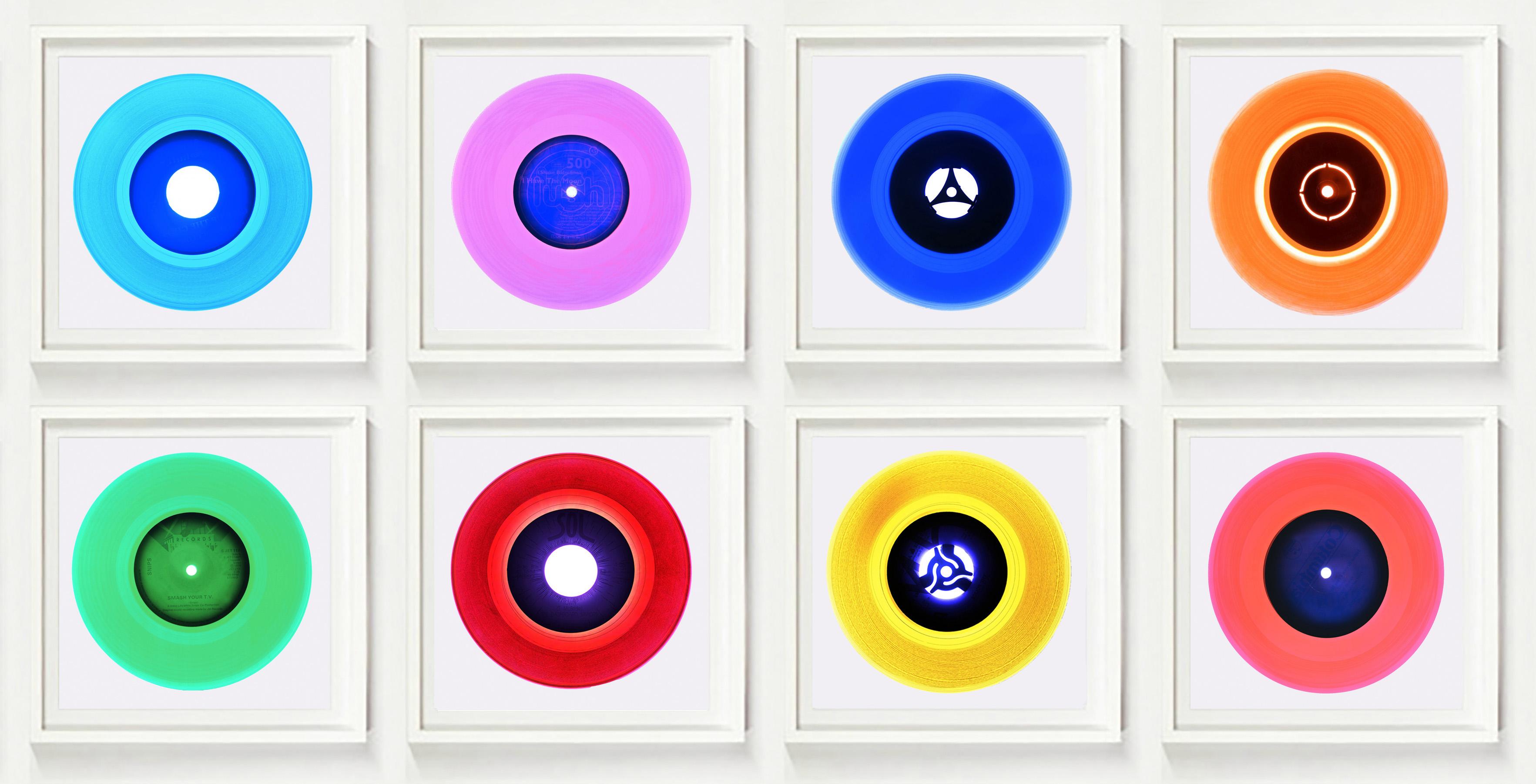 Heidler & Heeps B Side Vinyl Collection Eight Piece Multicolor Installation.
Acclaimed contemporary photographers, Richard Heeps and Natasha Heidler have collaborated to make this beautifully mesmerising collection. A celebration of the vinyl record