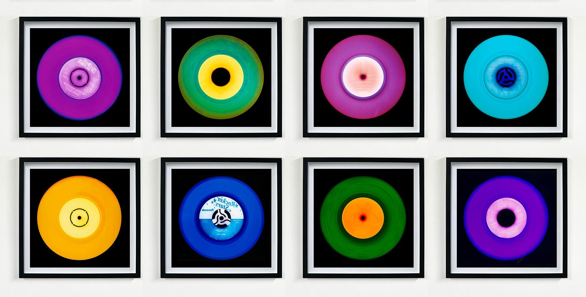 Heidler & Heeps Vinyl Collection Eight Piece Multicolor Installation.
Acclaimed contemporary photographers, Richard Heeps and Natasha Heidler have collaborated to make this beautifully mesmerising collection. A celebration of the vinyl record and