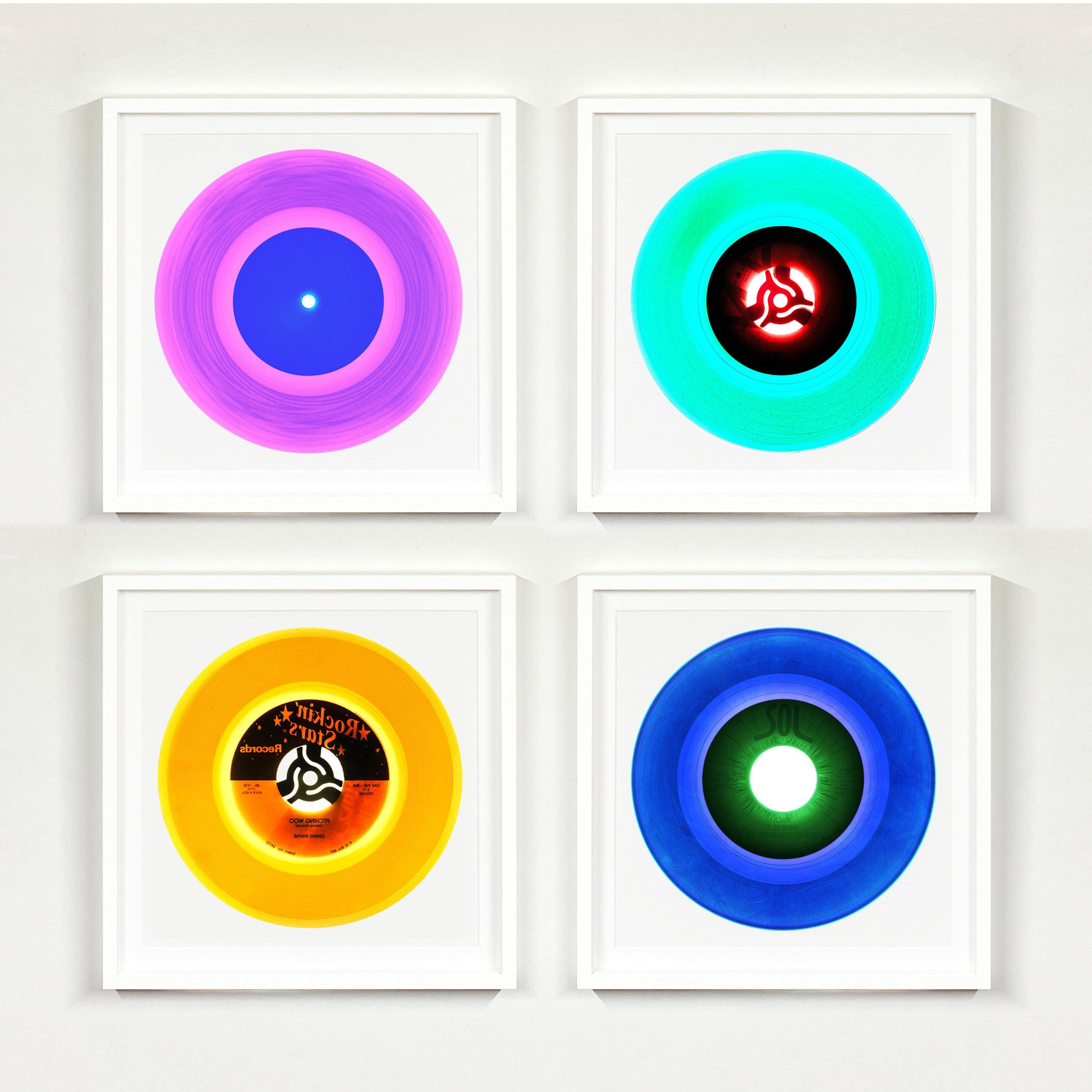 Heidler & Heeps Vinyl Collection Set of Four Framed Pop Art prints.
Acclaimed contemporary photographers, Richard Heeps and Natasha Heidler have collaborated to make this beautifully mesmerising collection. A celebration of the vinyl record and