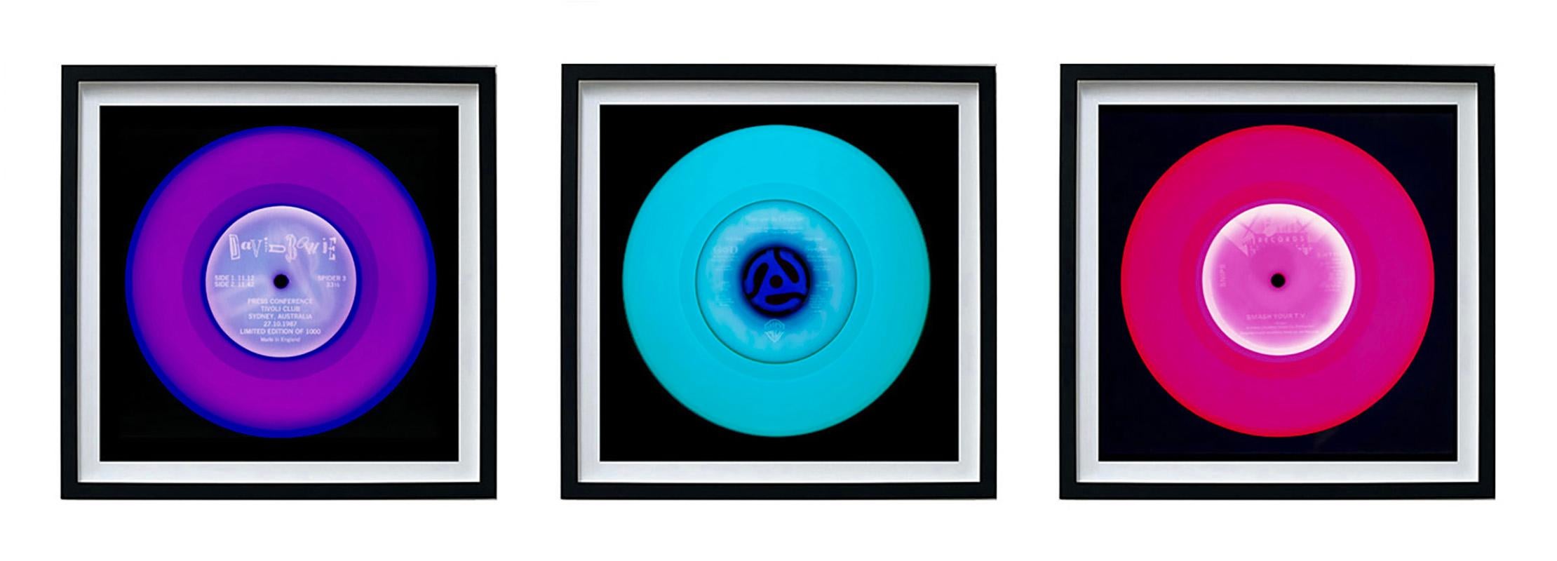 Heidler & Heeps Vinyl Collection Set of Three Framed Artworks.
Acclaimed contemporary photographers, Richard Heeps and Natasha Heidler have collaborated to make this beautifully mesmerising collection. A celebration of the vinyl record and analogue