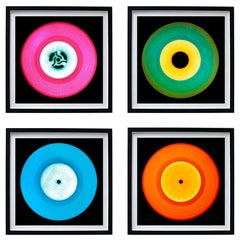 Ensemble de quatre petites photographies Pop Art multicolores encadrées en vinyle de la collection