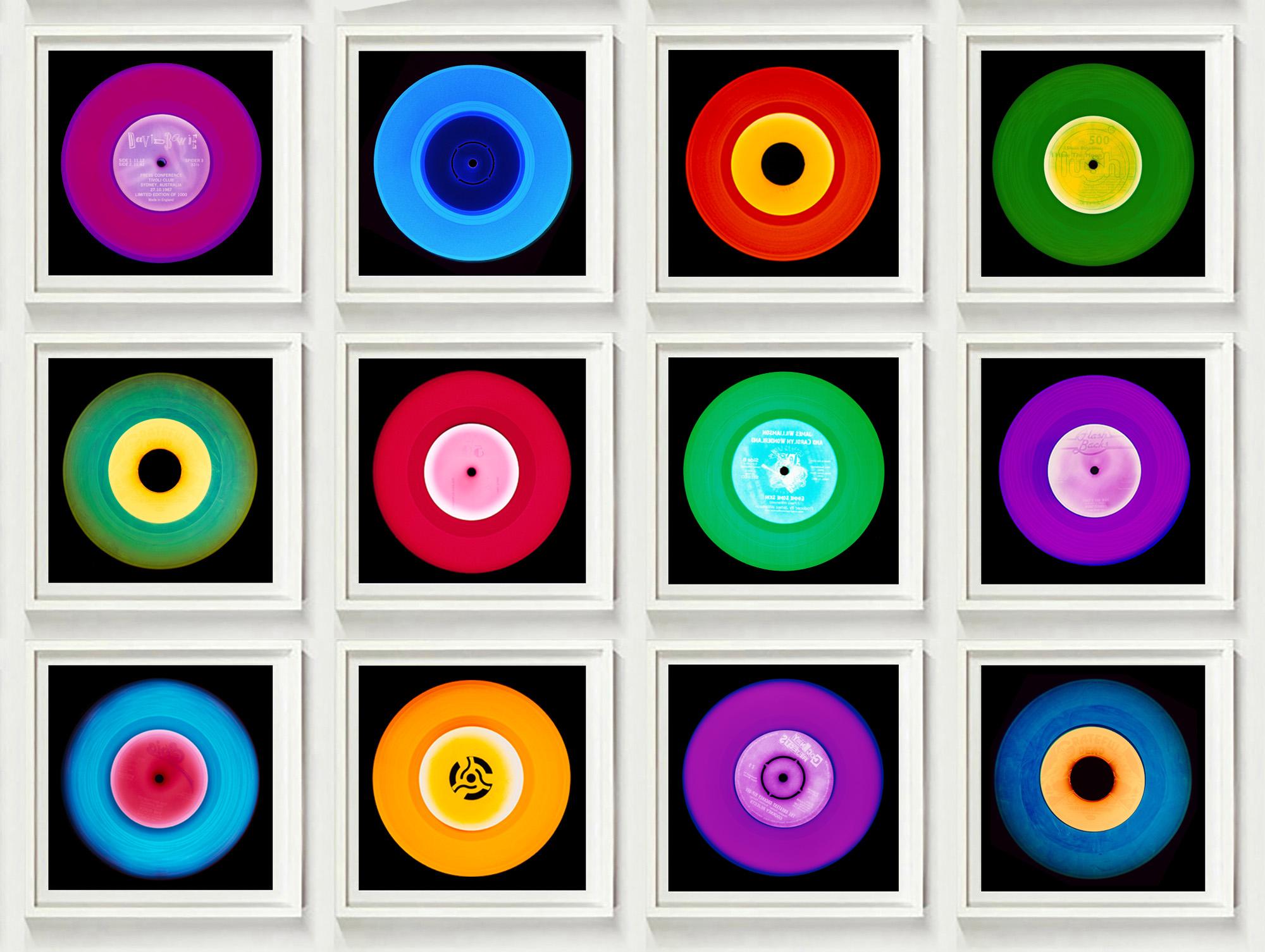Collection Vinyl douze pièces multicolores - Ensemble Pop Art encadré - Marron Color Photograph par Heidler & Heeps