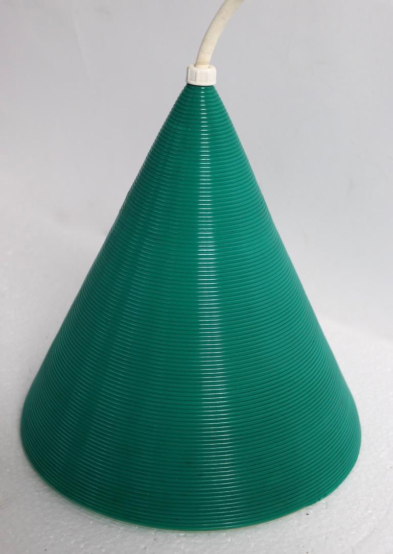 Architectural form ribbed plastic cone chandelier, Rotoflex by Heifetz for Moe Lighting. The green shell is suspended by a white cord, with the original brass ceiling cap, marked Moe Lighting. Original, clean, working condition, ready to