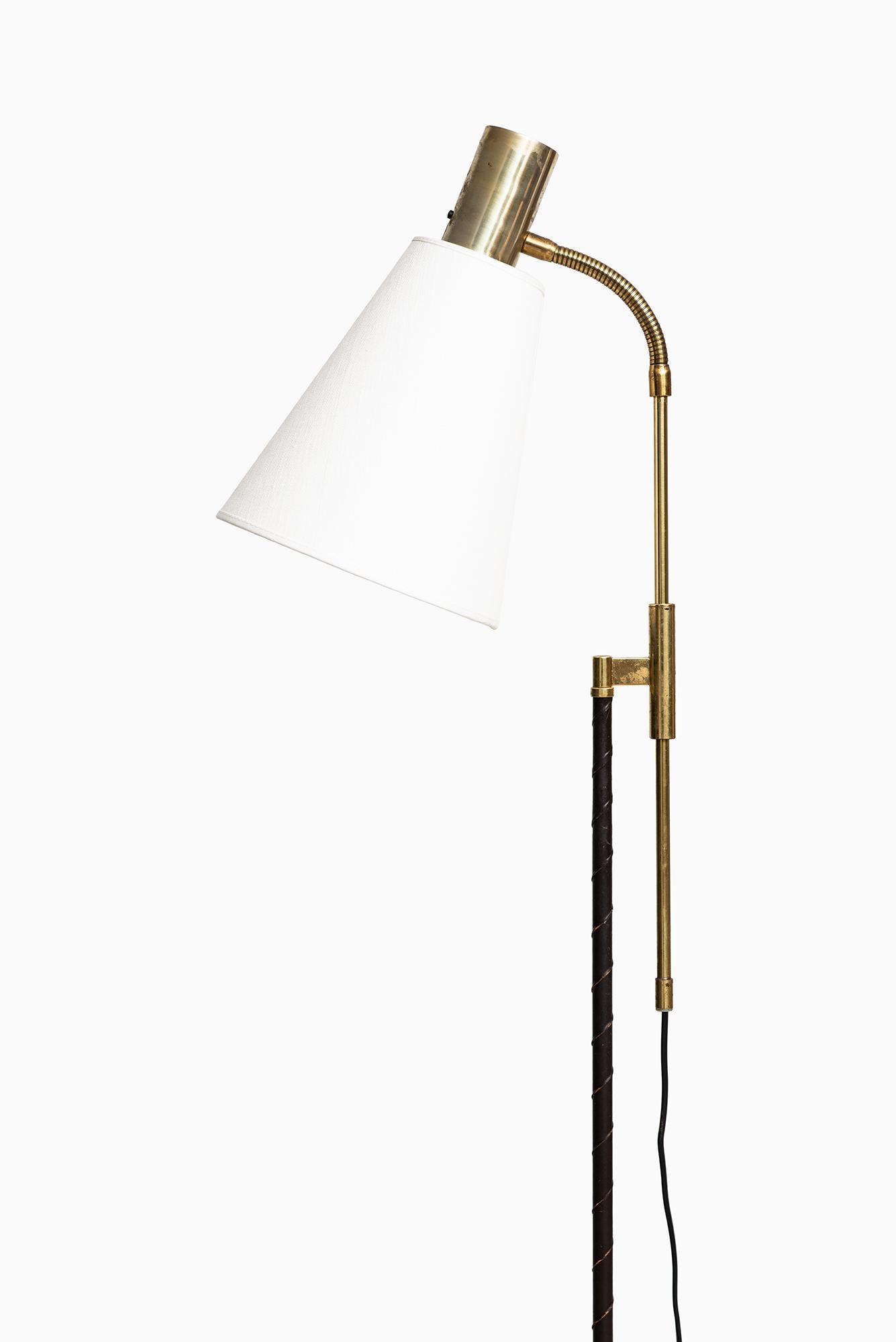 Height adjustable floor lamp. Produced by Falkenbergs Belysnings in Sweden.