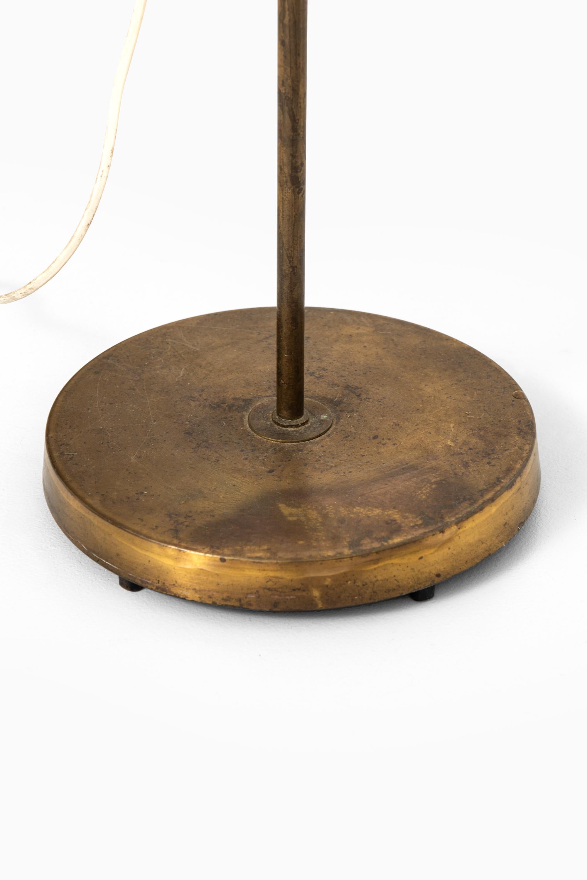 Scandinavian Modern Height Adjustable Floor Lamp in Brass Produced by Falkenbergs Belysning For Sale
