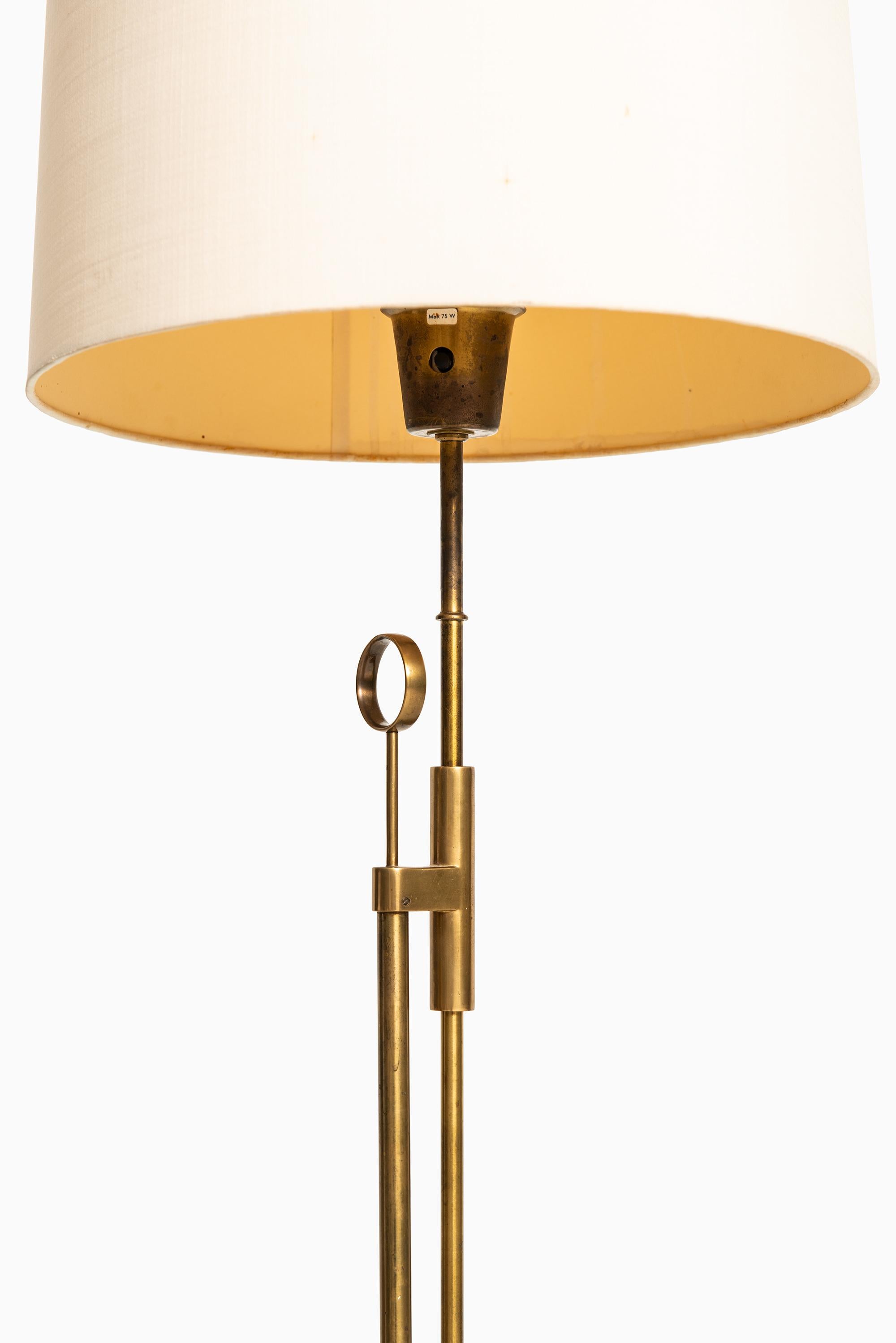 Height adjustable floor lamp. Produced by Falkenbergs Belysnings AB in Sweden.