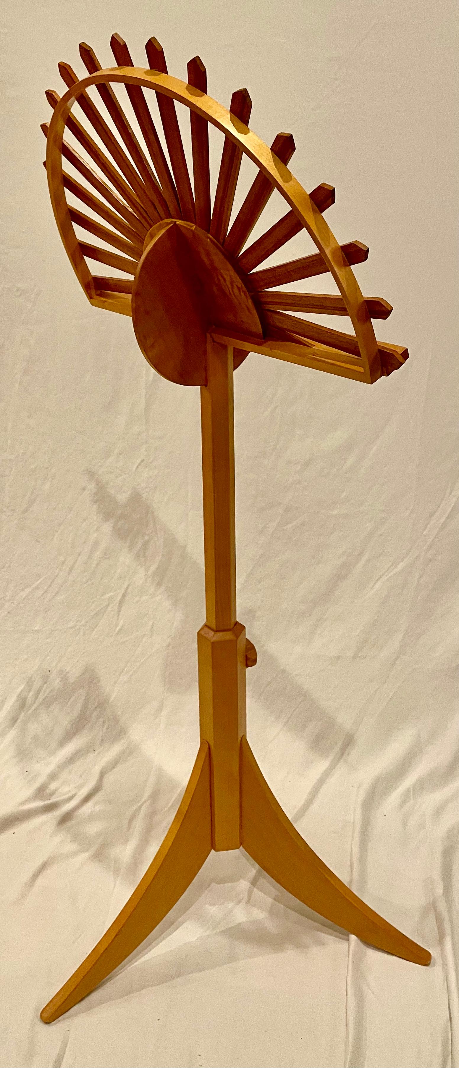 This beautiful height adjustable wooden music stand is made of maple with sun rays made grenadillo. It is height adjustable from 40 to 53