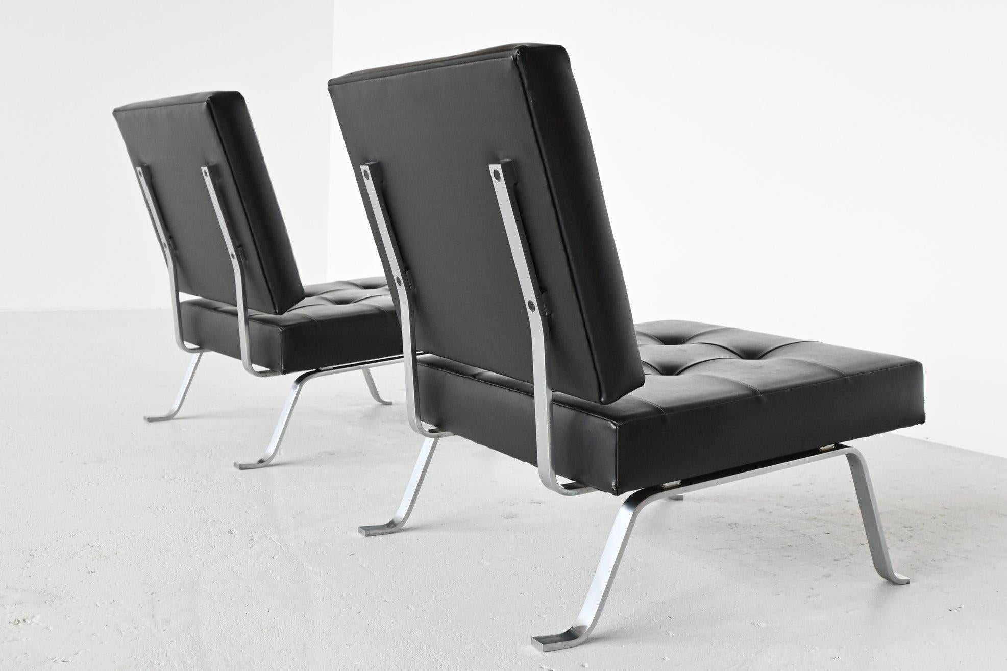 Very nice set of 2 lounge chairs model AP60 designed by Hein Salomonson for AP Original (Polak), The Netherlands 1960. This lounge chair set has solid brushed steel legs and black faux leather. It’s a combination of the Barcelona chair by Ludwig