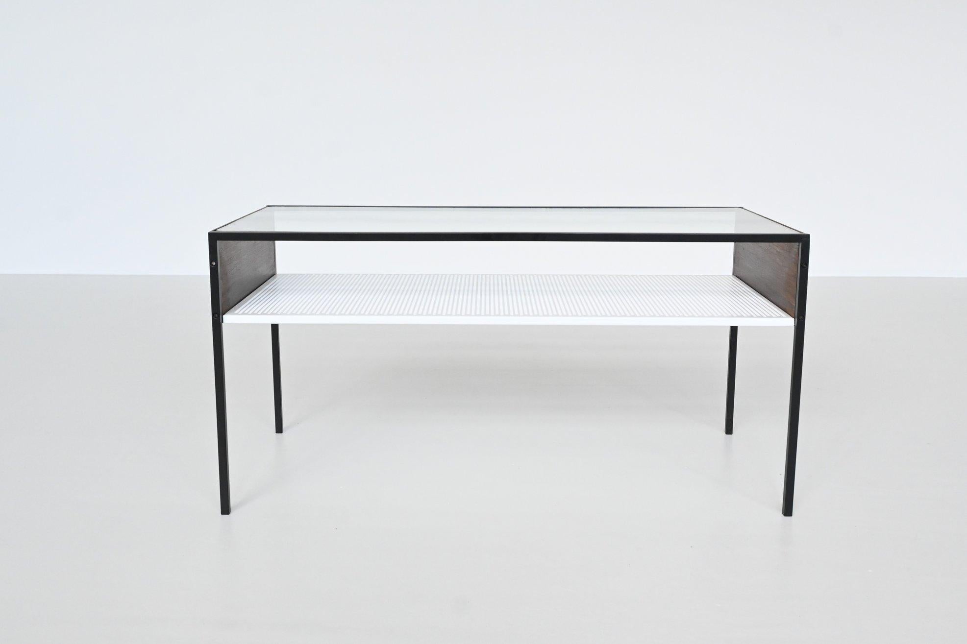 Very nice and rare minimalistic coffee table designed Hein Salomonson and manufactured by AP Originals, The Netherlands 1950. This coffee table is very minimal in its aesthetic. It has clean rectilinear lines comprising a black coated metal frame