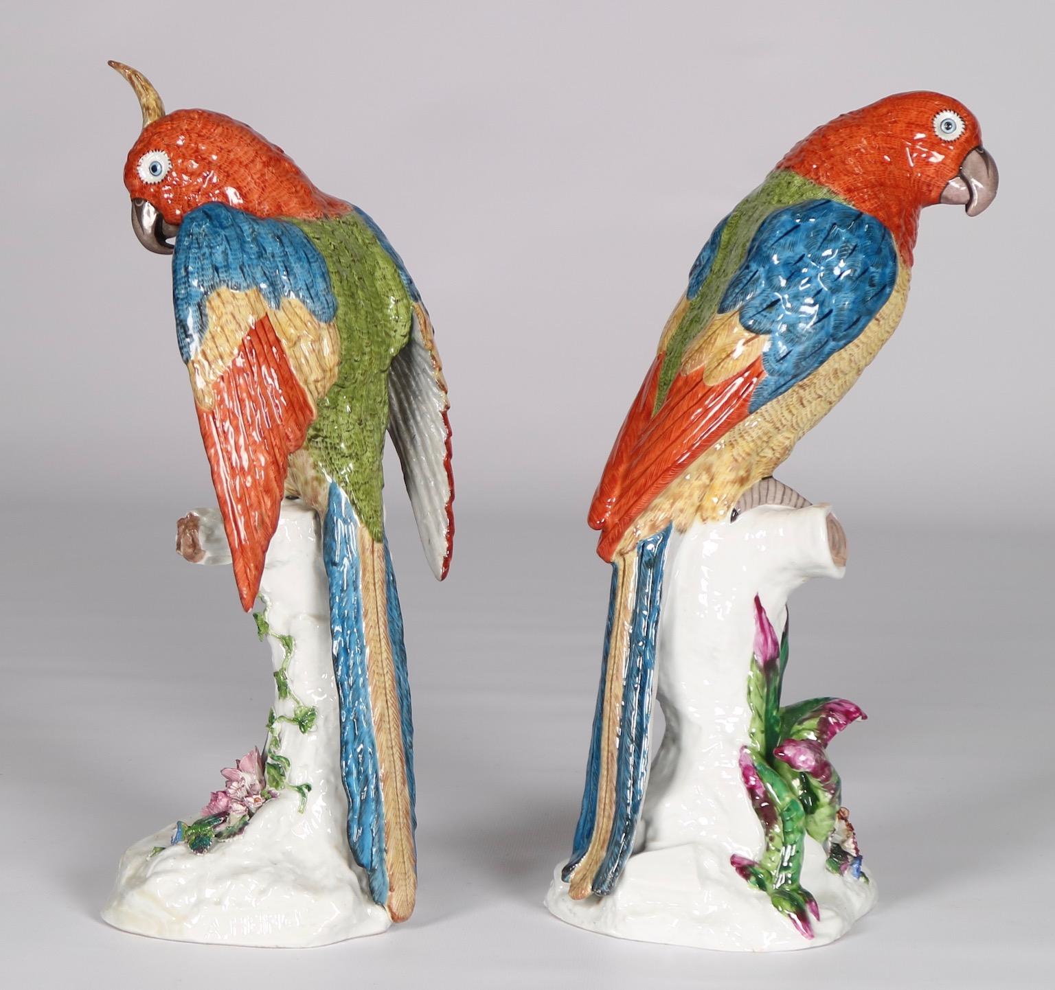 German porcelain parrots with spurious Meissen blue crossed sword marks. These parrots date from the late 19th century and impressed ‘A. Heingle’ to the base. Each is in excellent vintage condition and have wear consistent with age and use.
 
