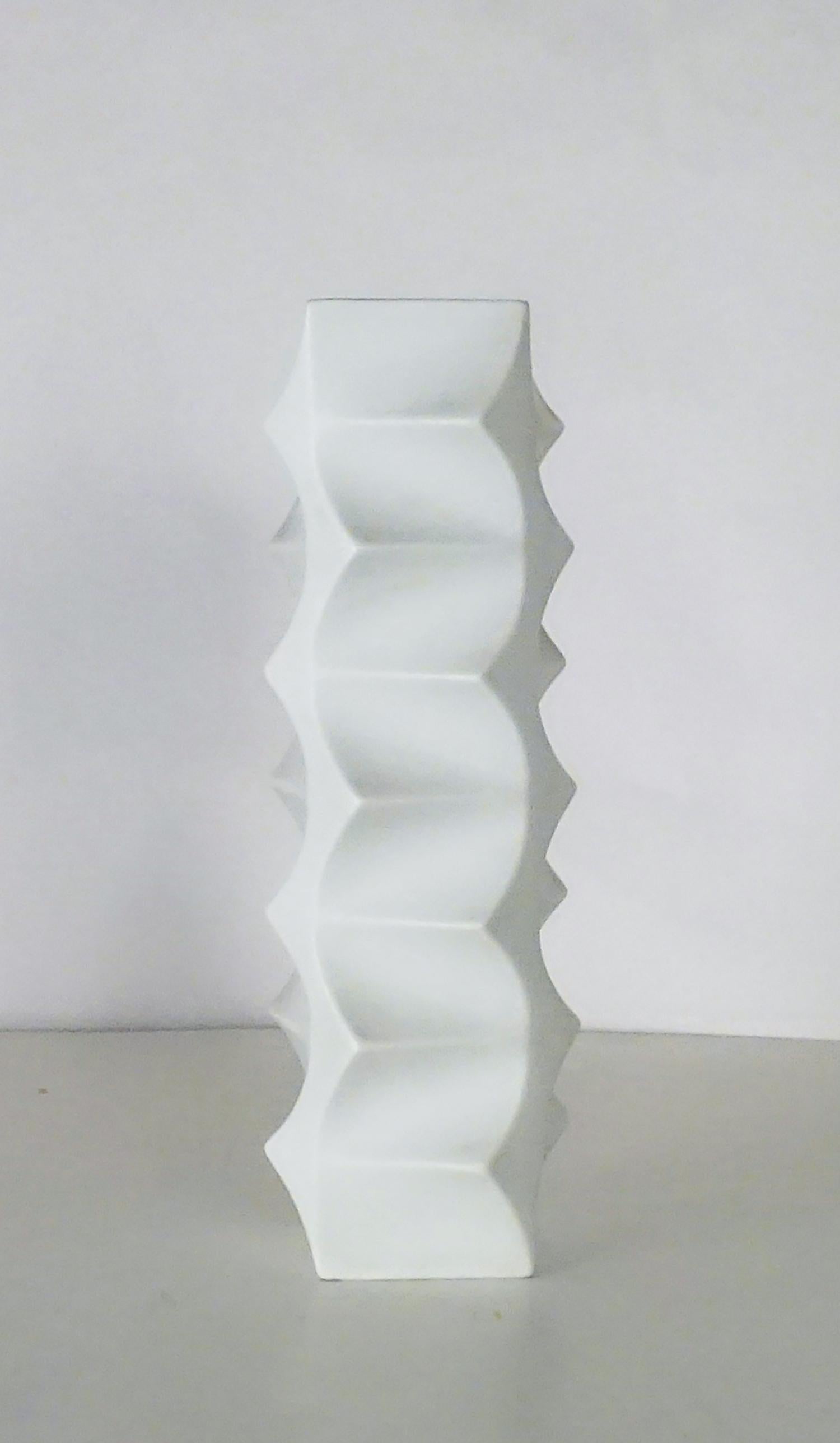 Sculptural porcelain vase by Heinrich Fuchs for Hutschenreuther, released between 1968 and 1970. Matte exterior, gloss interior. Marked