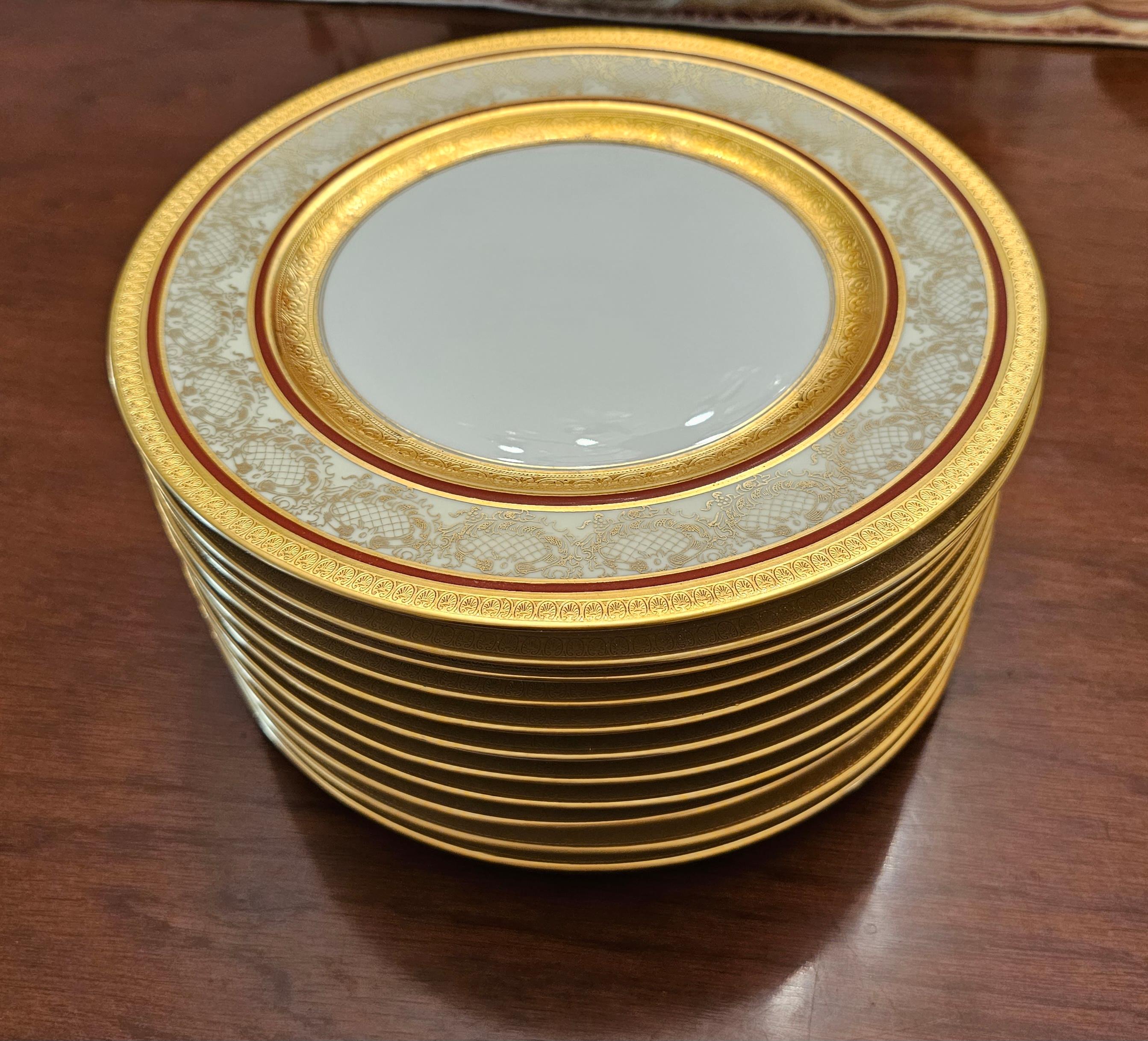 An exceptional set of 11 Heinrich Selb porcelain and gold encrusted dinner plates in white body in good antique condition.Listed price is for the set of 11. and not per item
Measure 11 inches in diameter and 1 inch in height.