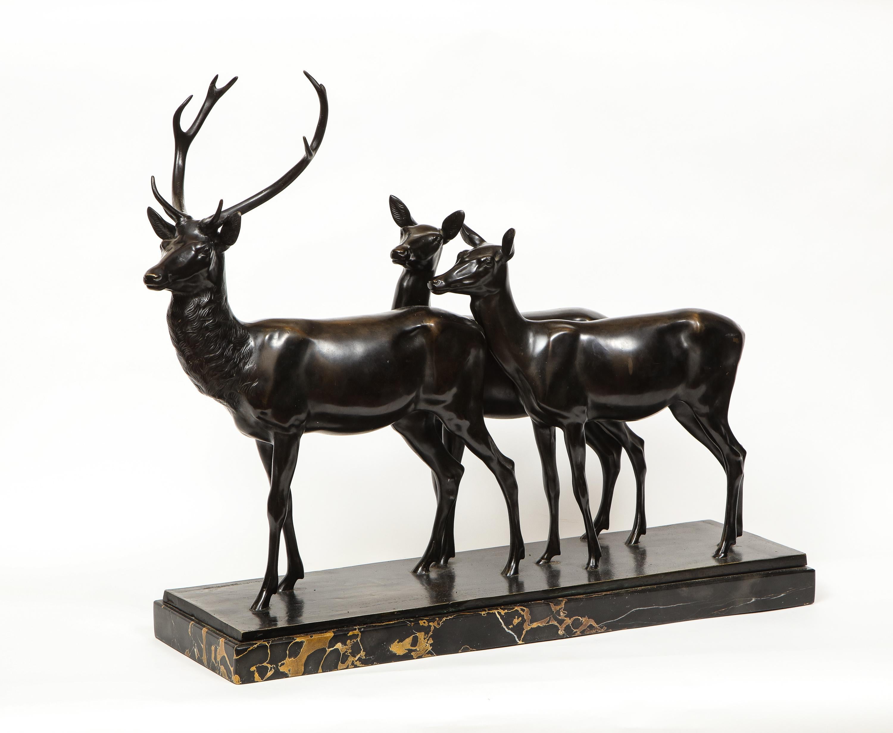 Heinrich Karl Scholz (Austria, 1880-1937) A Fine Art Deco Patinated Bronze Group of Deer, depicting a stag and his two doe's, circa 1925

This magnificent sculpture is extremely chic and decorative. The subject and quality are very appealing to