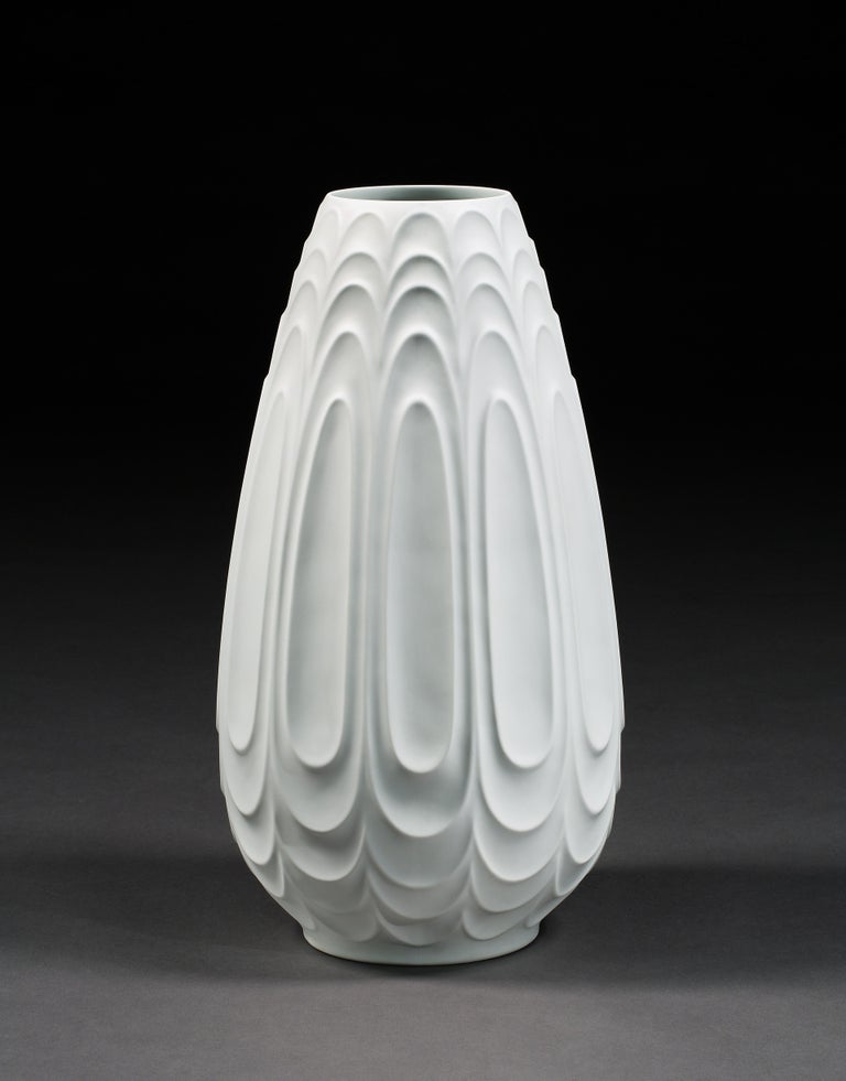 H&C Heinrich, massive, white, porcelain, sculpted, floor standing, vase, circa 1960

- The massive height, white monochrome and sculpted surface create a rare, floor standing, ceramic sculpture, vase
- The five vertical layers of elongated oval
