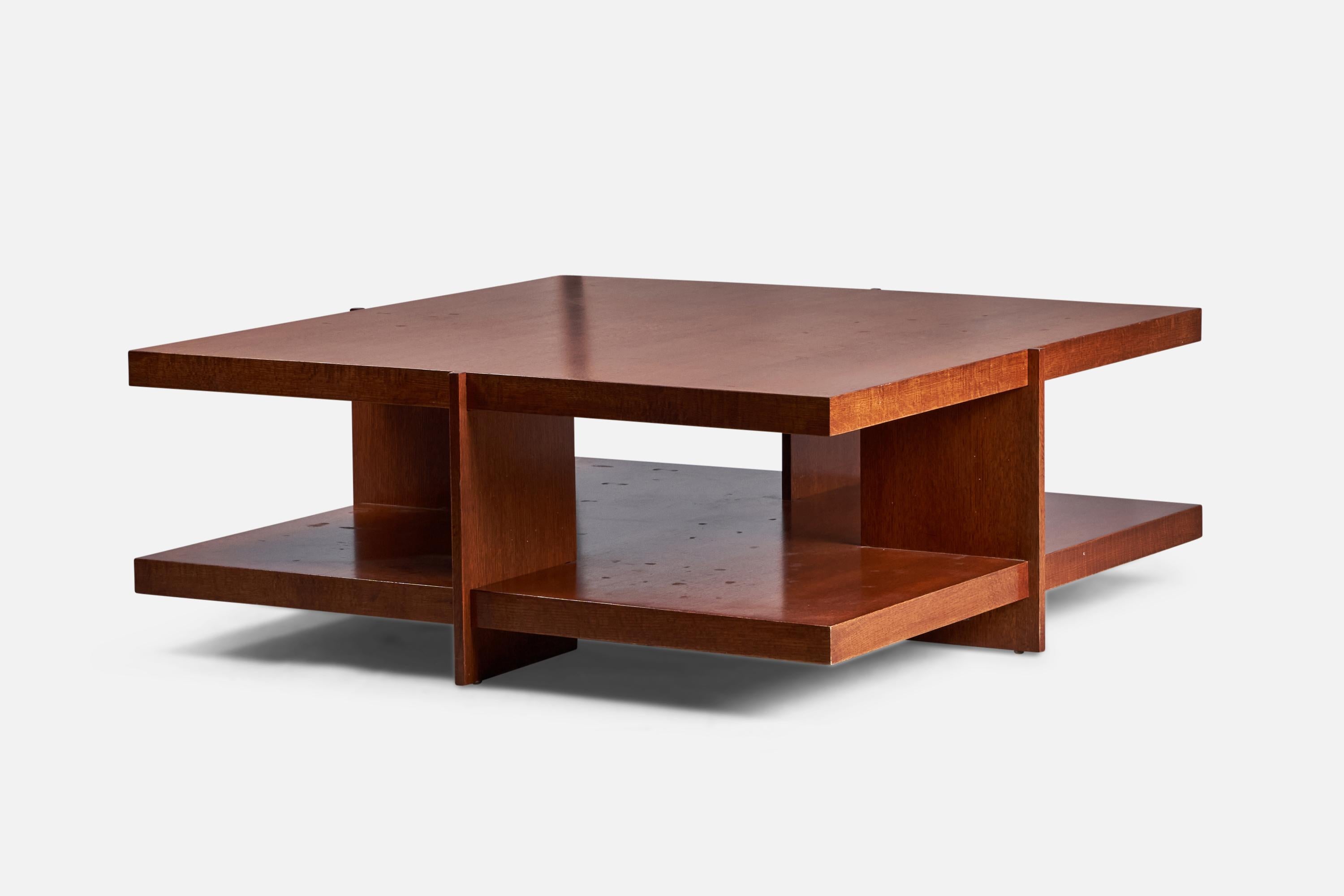 A sizeable wood and quarter sawn oak veneer coffee or cocktail table produced by Heinz & Co, USA, c. 1985. 

After a design by Frank Lloyd Wright from 1940.