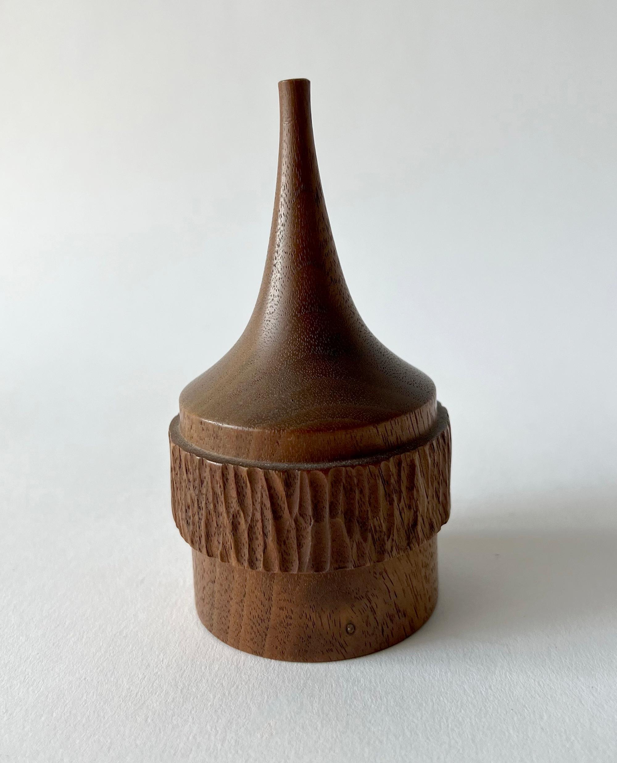 Hand turned wood weed vase created by Heinz Norhausen. Vase measures 4.5