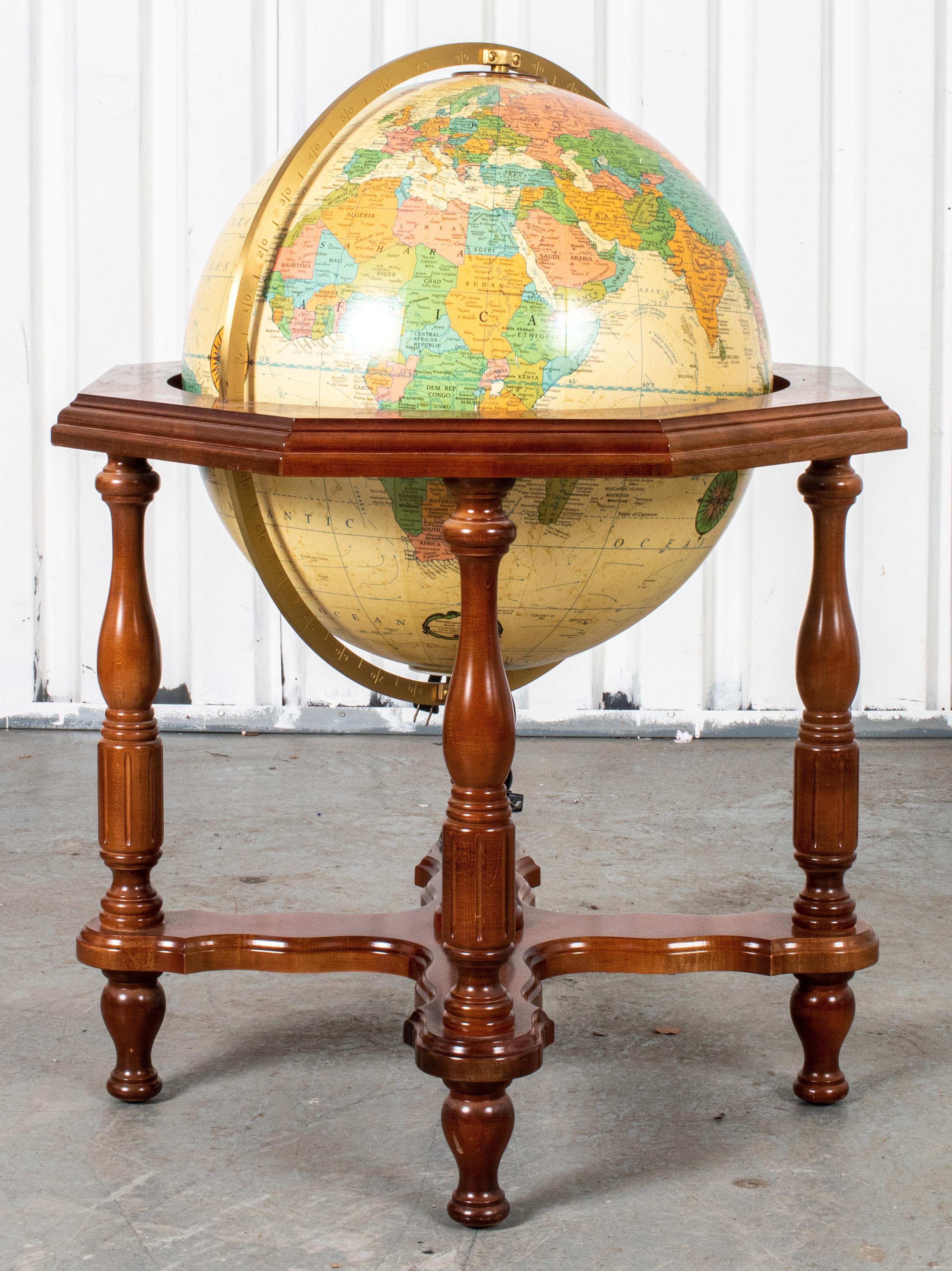 Heirloom light-up globe on wooden stand. 38