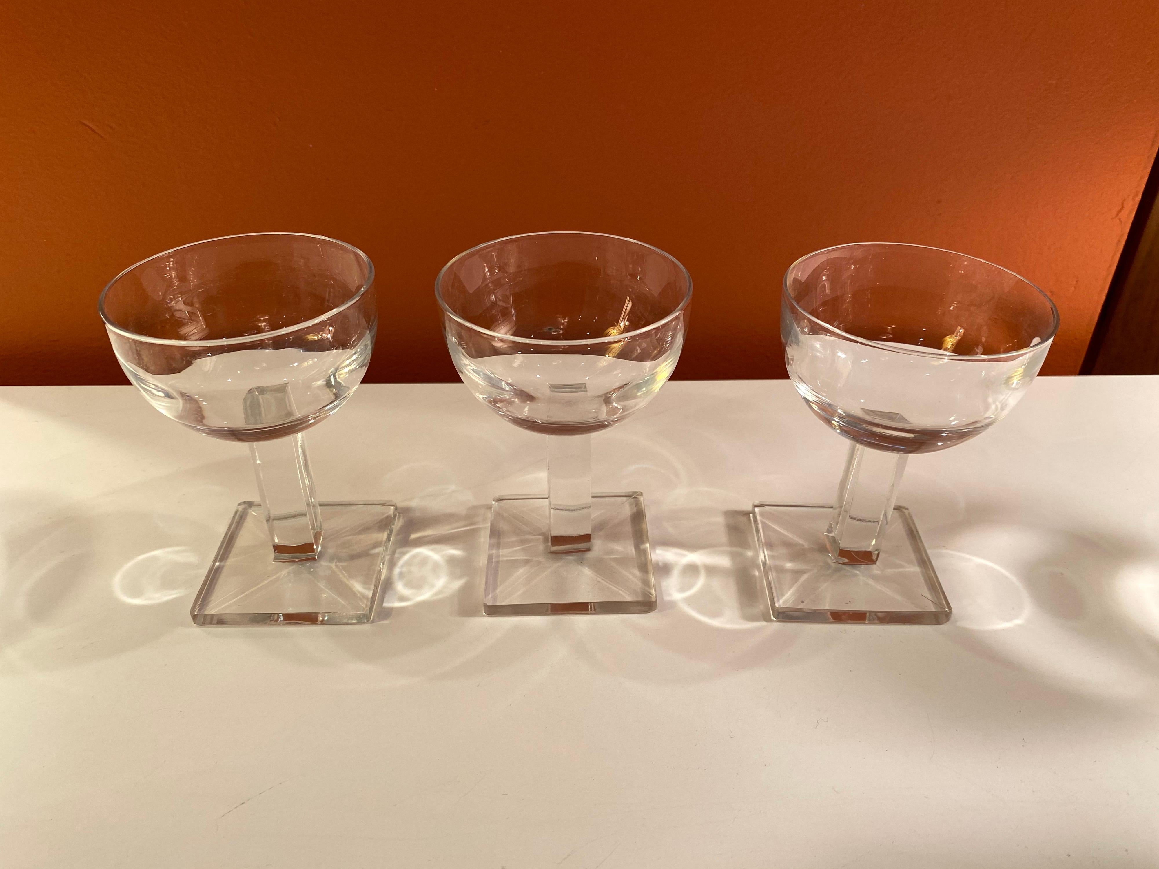 Set of 8 Heisey style new era stemware. Square bases with square columns.