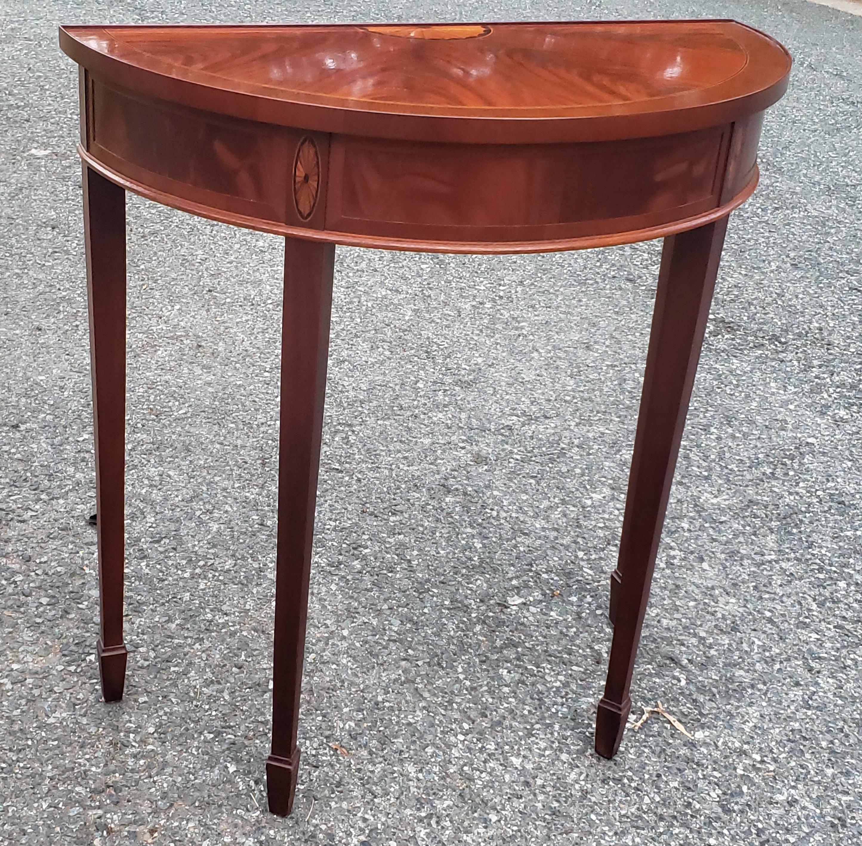 From Hekman Furniture Copley Place Collection is this well proportioned swirl mahogany demilune console or hall table in great vintage condition. Measures 30