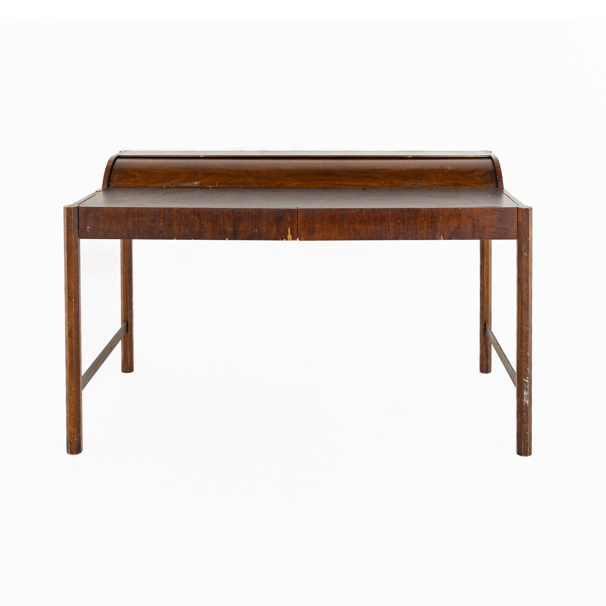 Hekman Furniture mid century desk with cylinder roll

The desk measures: 53 wide x 28 deep x 33 inches high

All pieces of furniture can be had in what we call restored vintage condition. That means the piece is restored upon purchase so it’s