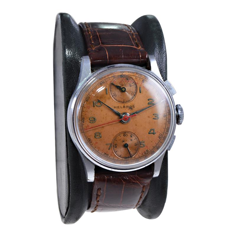 FACTORY / HOUSE:  Helbros Watch Company
STYLE / REFERENCE:  2 Register Chronograph 
METAL / MATERIAL: Stainless Steel
DIMENSIONS: Length 38 mm X Diameter 22 mm
CIRCA: 1940's
MOVEMENT / CALIBER: Manual Winding / 17 Jewels / Cal. Venus 170
DIAL /