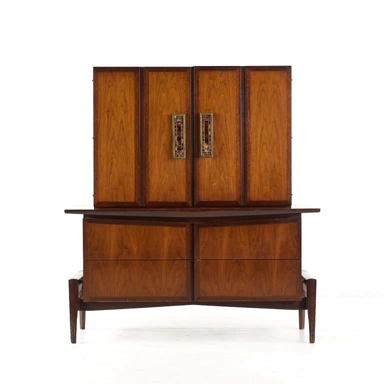 Helen Hobey Baker mid century walnut armoire gentlemans chest

This armoire measures: 49 wide x 31 deep x 53.75 inches high

All pieces of furniture can be had in what we call restored vintage condition. That means the piece is restored upon