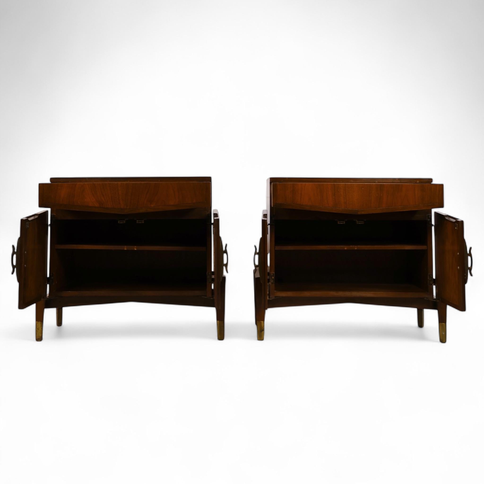 This rare pair of 1960s nightstands by husband and wife team Helen Hobey Baker embodies the duo’s refined approach to mid-century design, marked by bold geometry and distinctive materials. Each nightstand features a cantilevered drawer over a pair