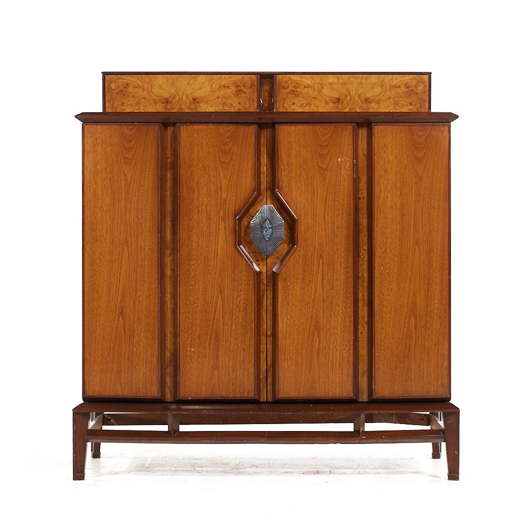 Helen Hobey for Baker Mid Century Walnut Highboy Dresser

This highboy measures: 45.75 wide x 21 deep x 49 inches high

All pieces of furniture can be had in what we call restored vintage condition. That means the piece is restored upon purchase so