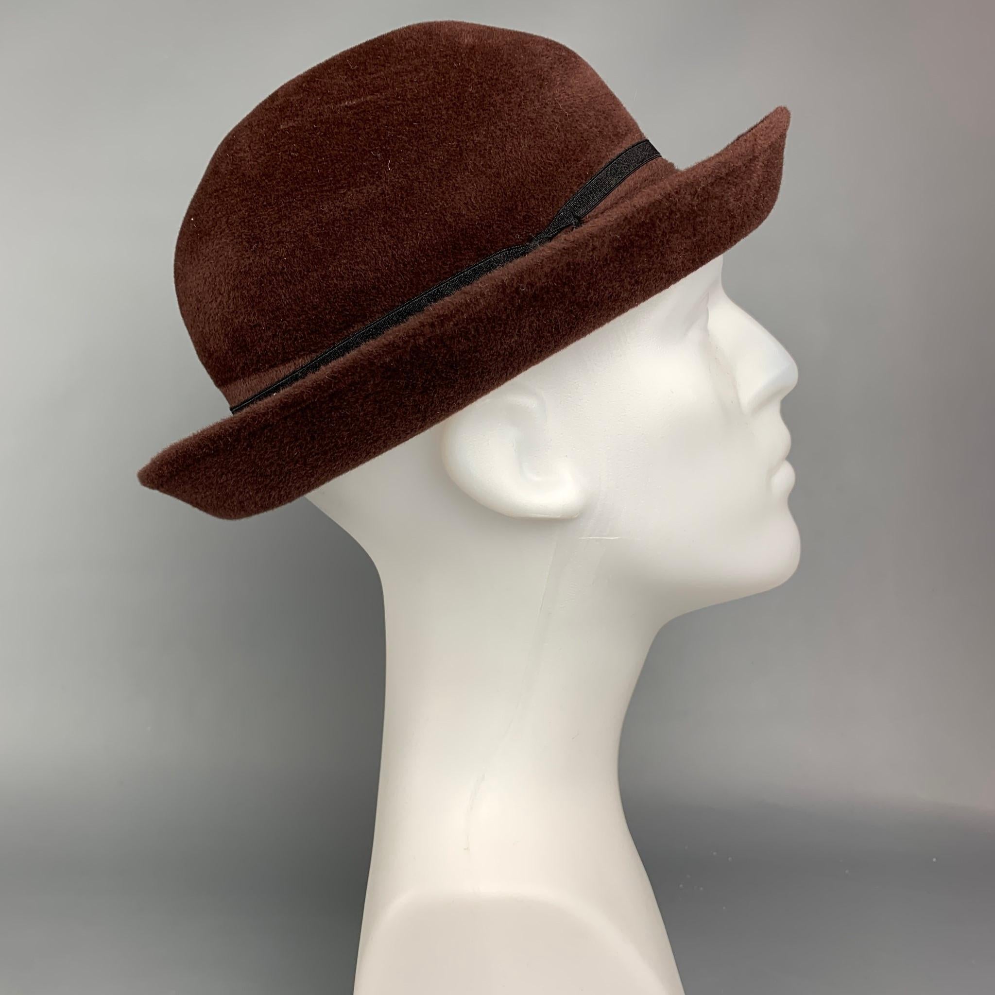brown round hat