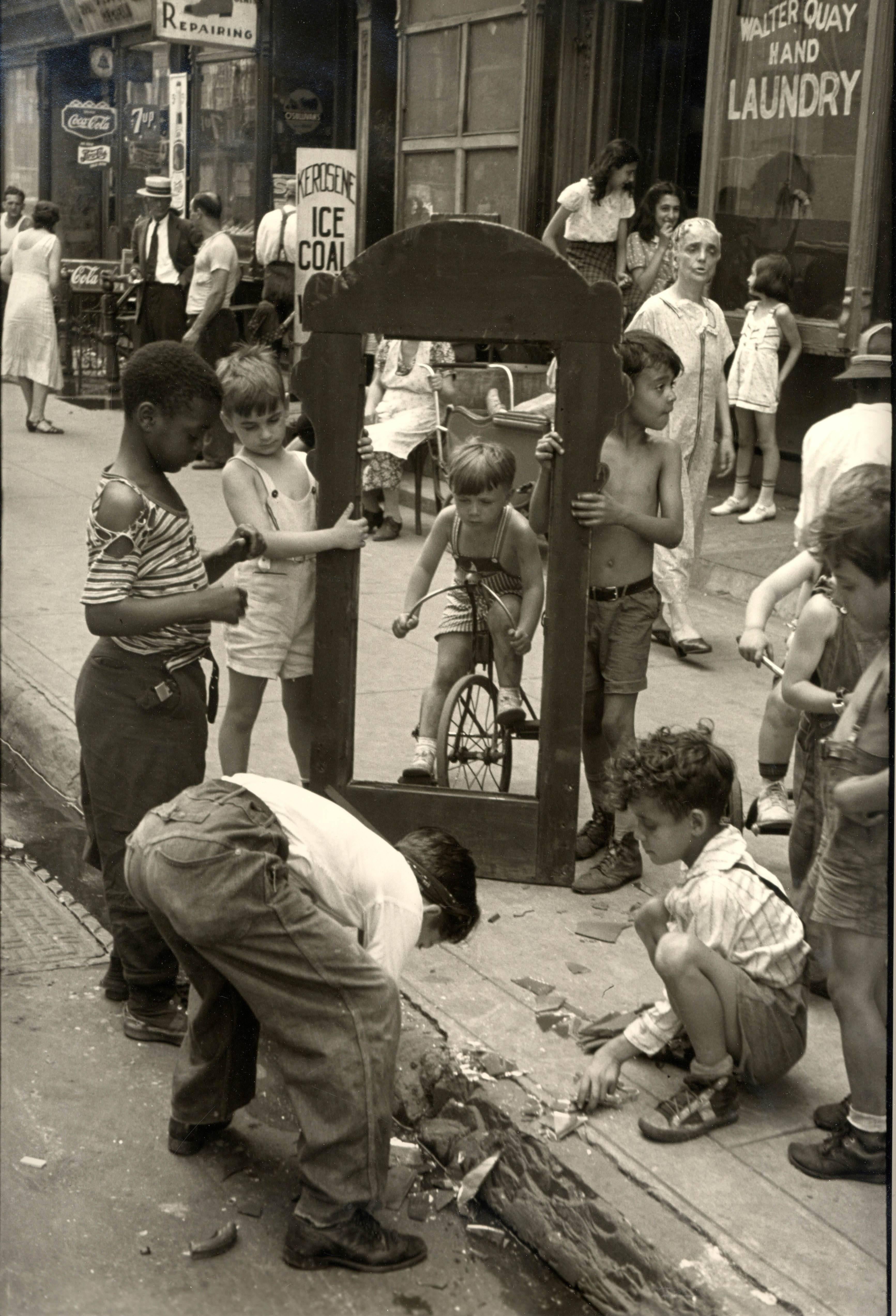 Helen Levitt Figurative Photograph - New York City (broken mirror)