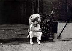 New York (one boy consoling another)