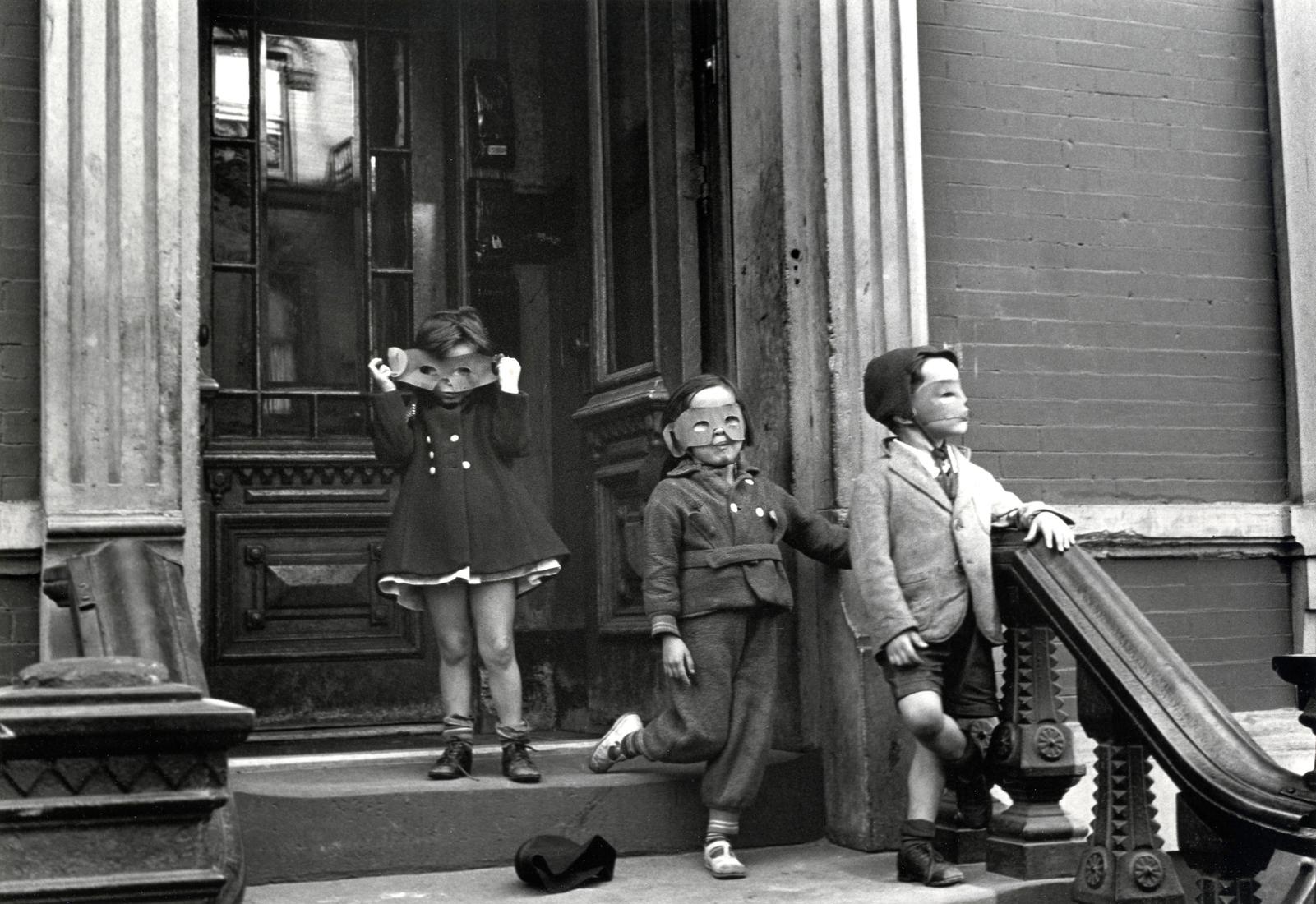 Helen Levitt Portrait Photograph - New York (three kids with masks)