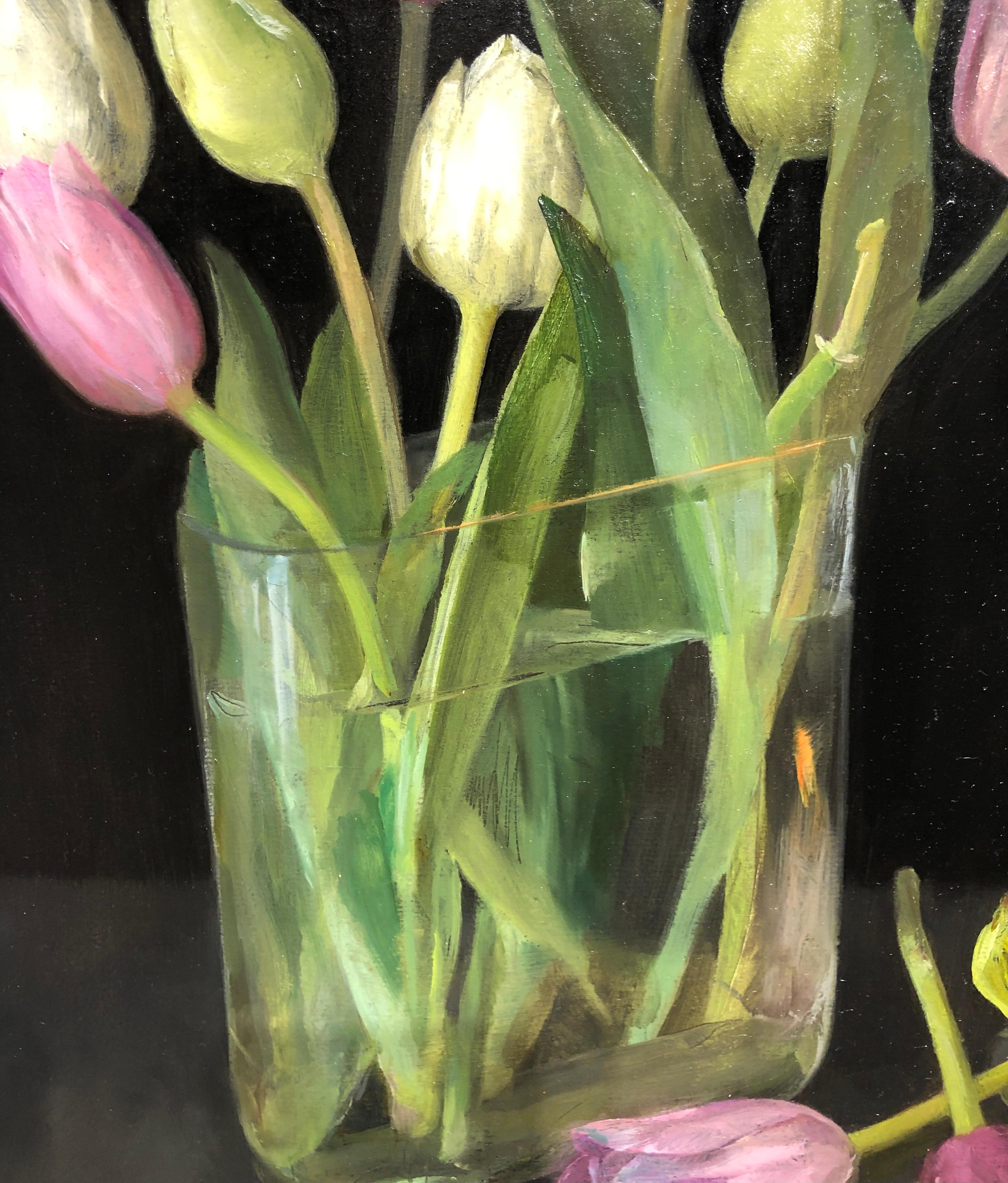 tulips in glass vase