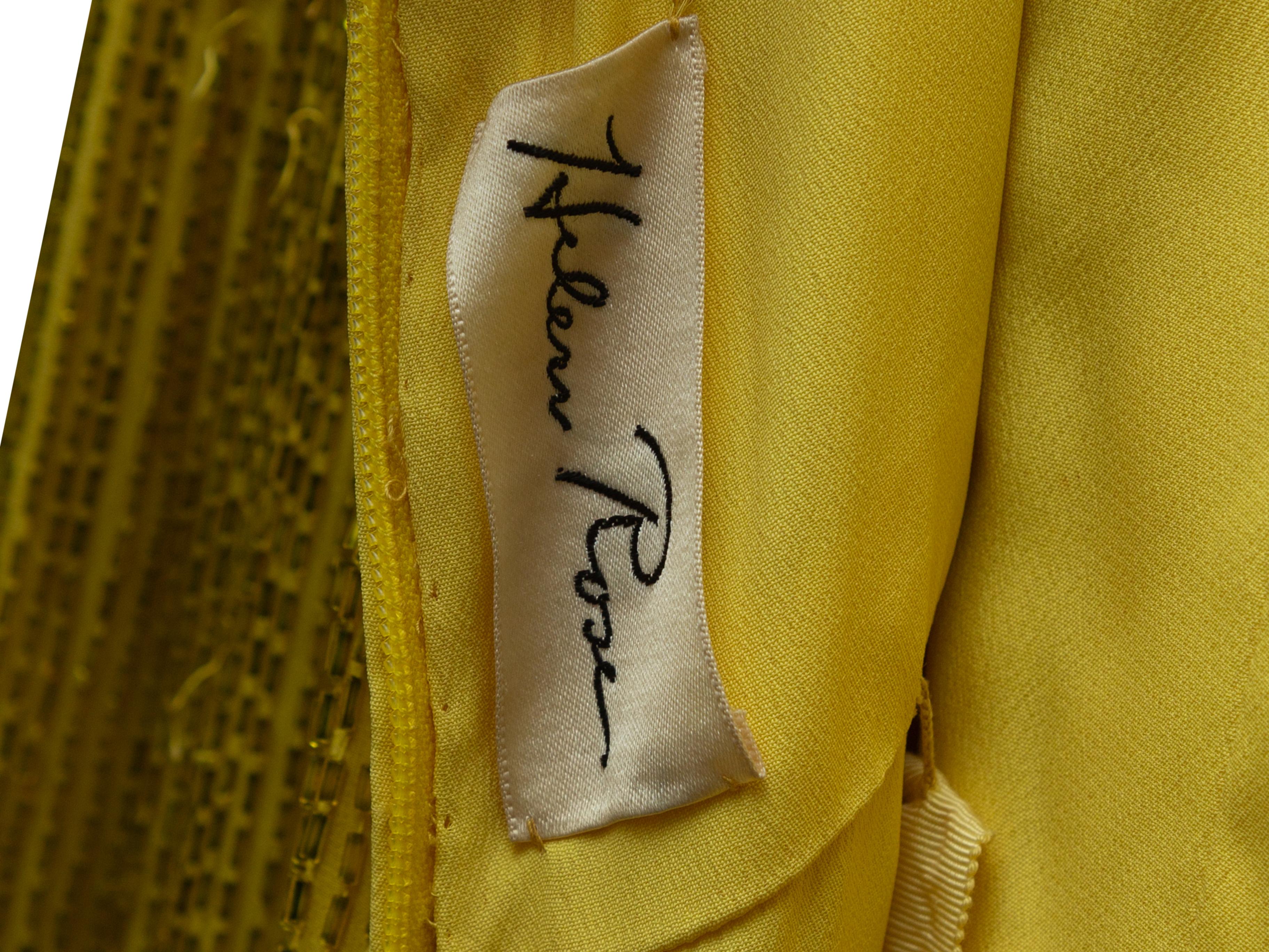 Product details: Vintage yellow evening dress by Helen Rose. Circa 1960s. Bead and sequin embellishments throughout. Scoop neck. Short Sleeves. Zip closure at center back. 28