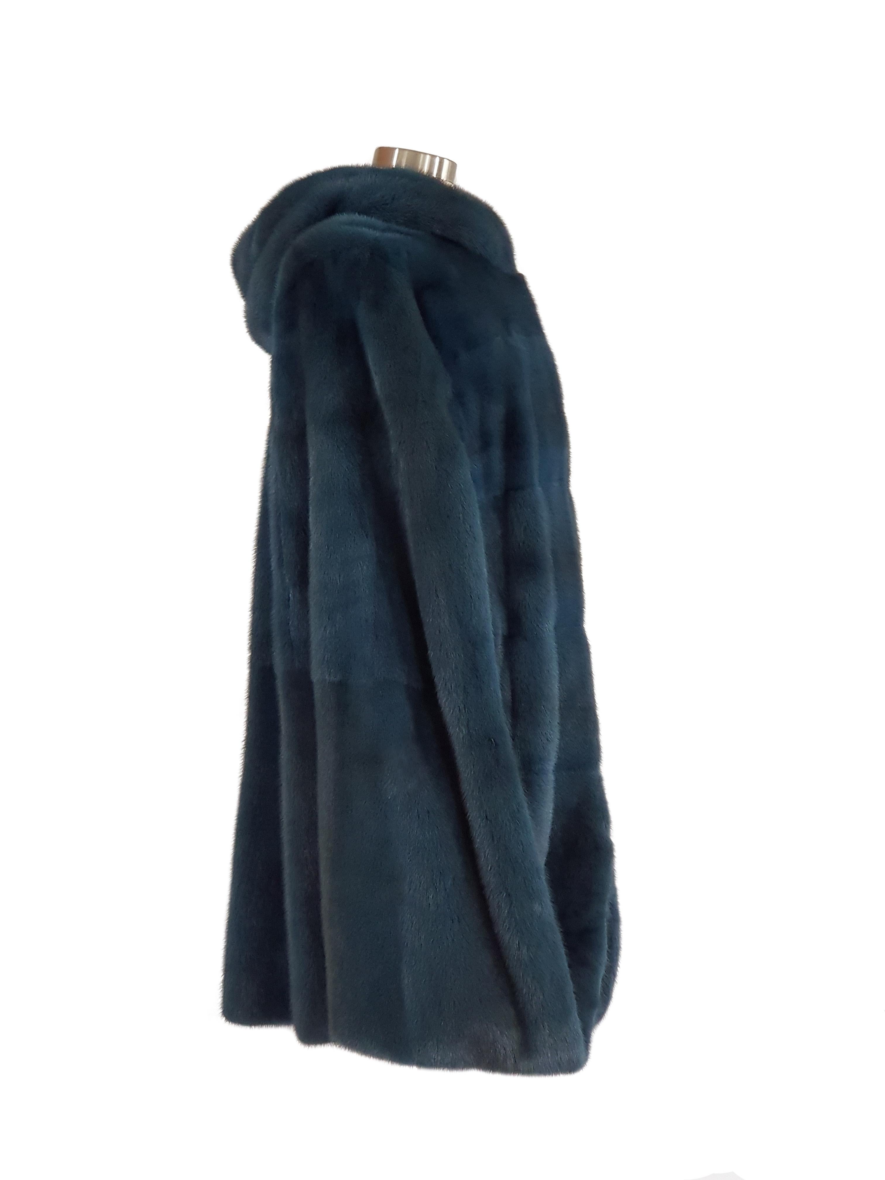 Reversible colored mink poncho with snap closure and hooded. Helen Yarmak exclusive detachable 100% silk lining.