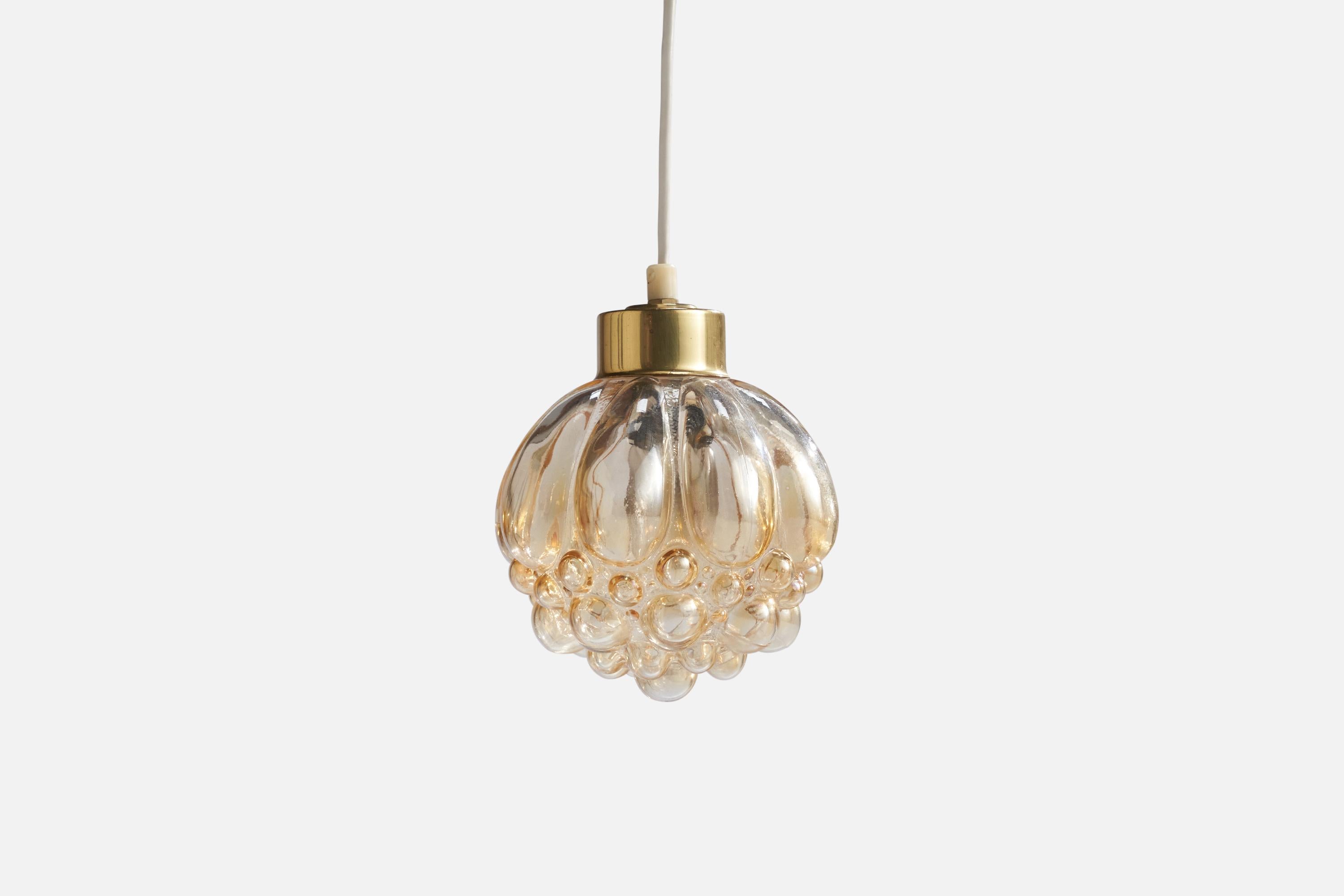 A brass and glass pendant attributed to Helena Tynell for Glashütte Limburg, Germany, 1950s.

Dimensions of canopy (inches): 6.5”  H x 5.75”  Diameter
Socket takes standard E-14 bulbs. 1 socket.There is no maximum wattage stated on the fixture. All