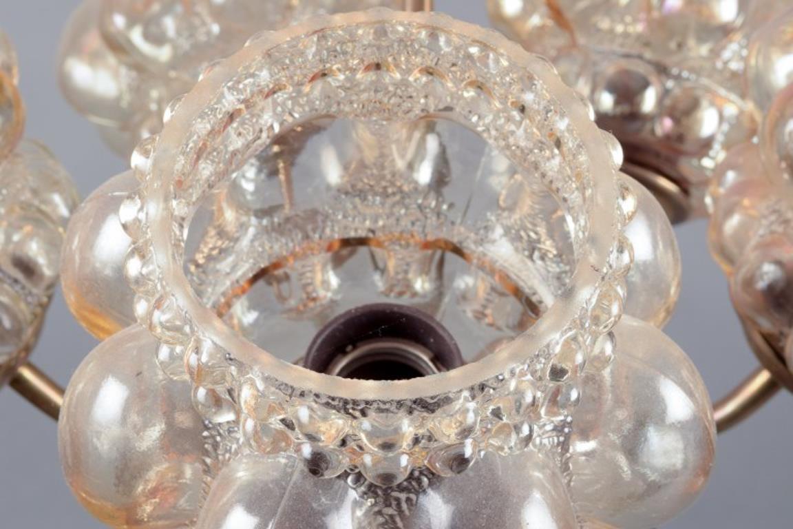 Vetro Helena Tynell. Lampada da soffitto a cinque bracci in ottone. 1970s in vendita