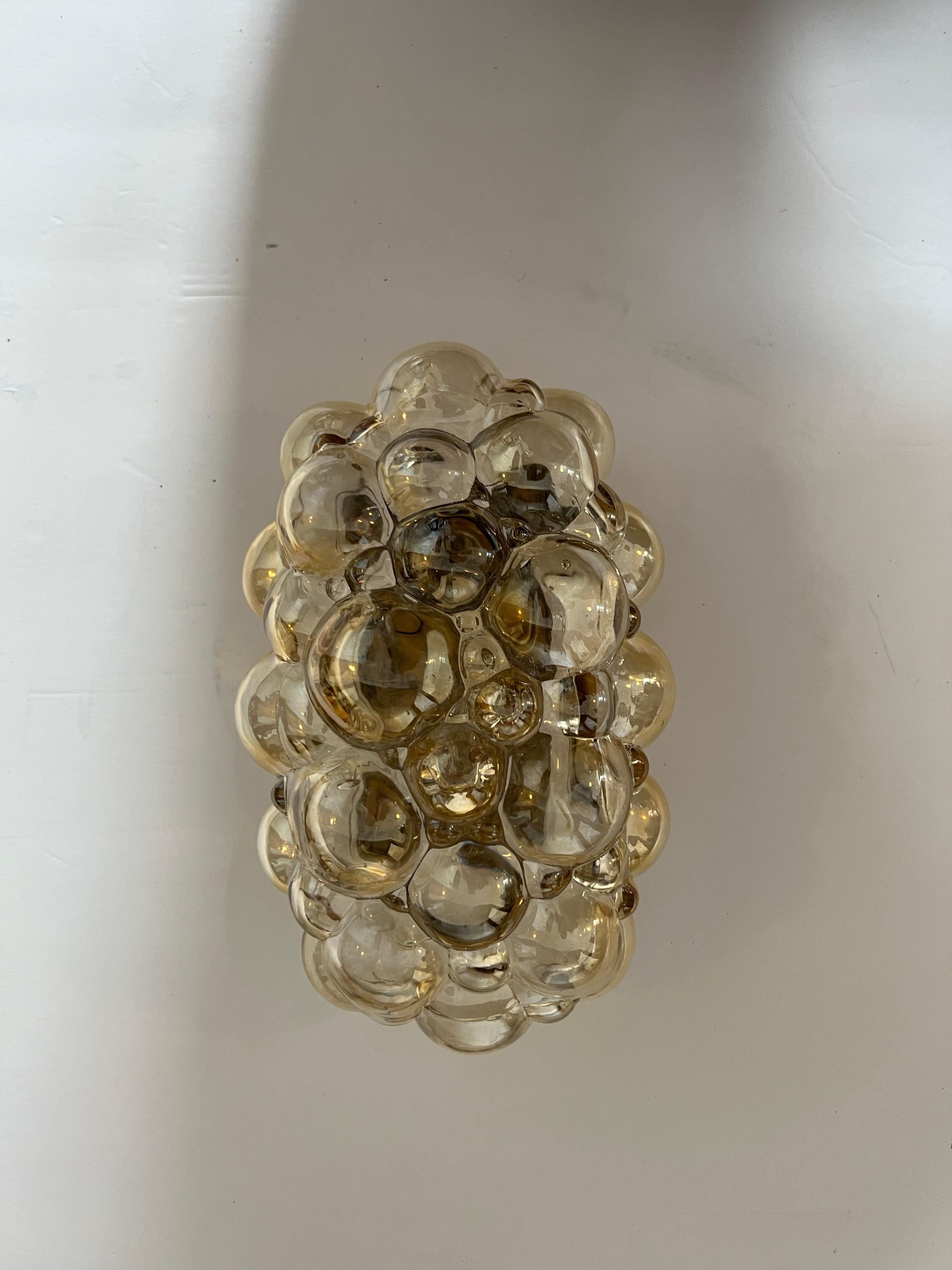 A wonderful light amber bubble glass sconce by Limburg Glass. 1960 rewired.