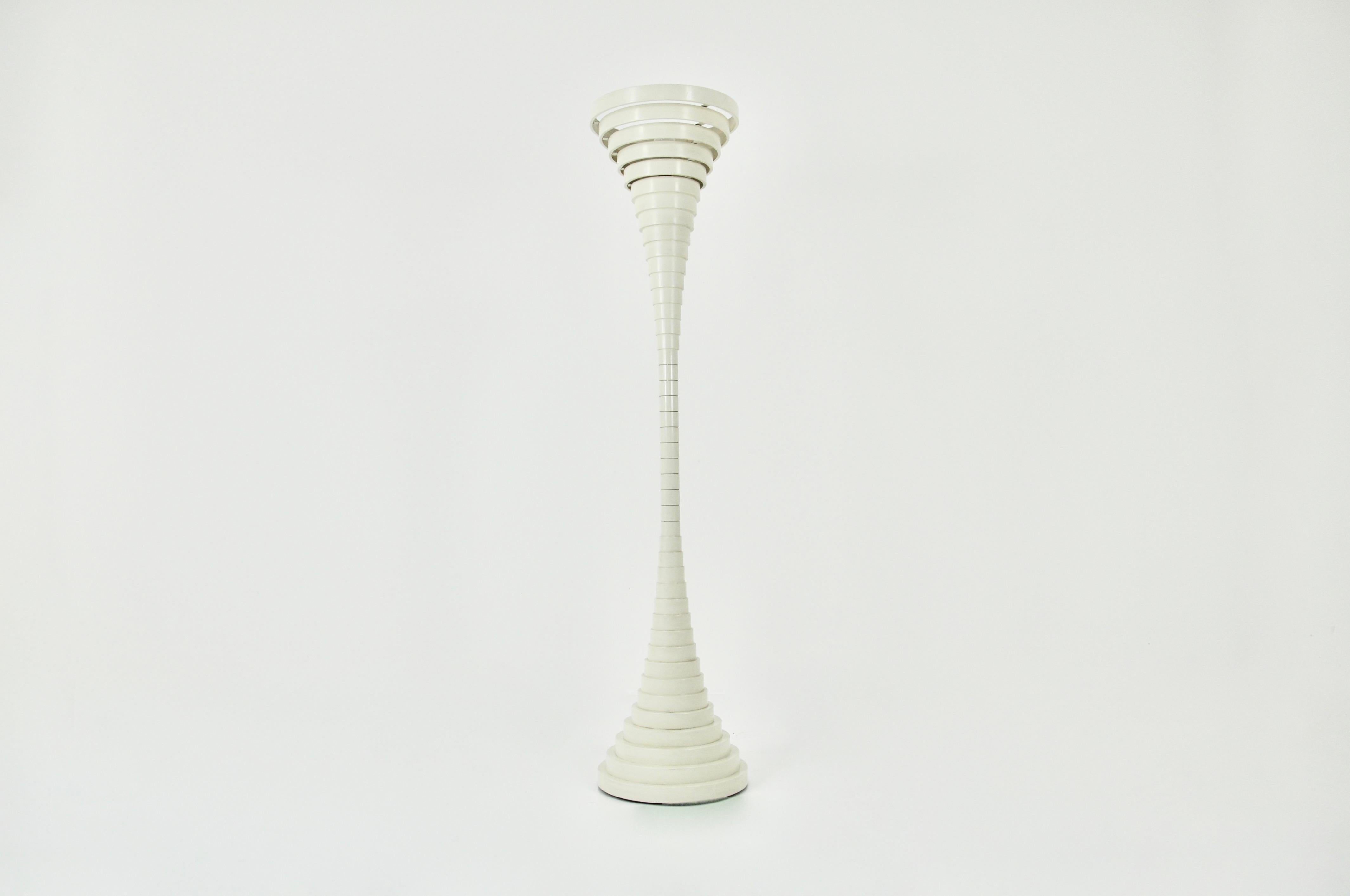 Creamy white wooden floor lamp by Silvio Bilancione. Wear due to age and age of the floor lamp.