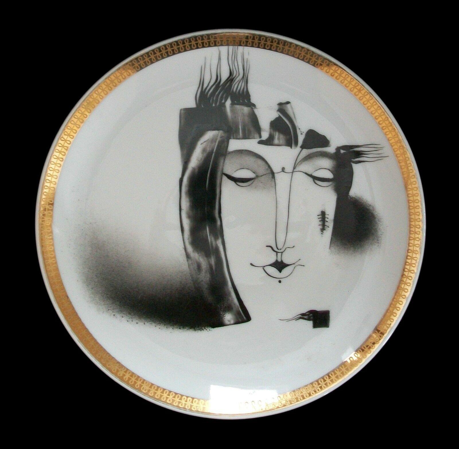 Helga Ingeborga Melnbarde - 'Portrait' - Important contemporary European studio ceramic plate - hand painted on a Czech porcelain 'blank' - featuring an Expressionist female portrait with scar and 'infinity' gilt border - signed and dated verso -