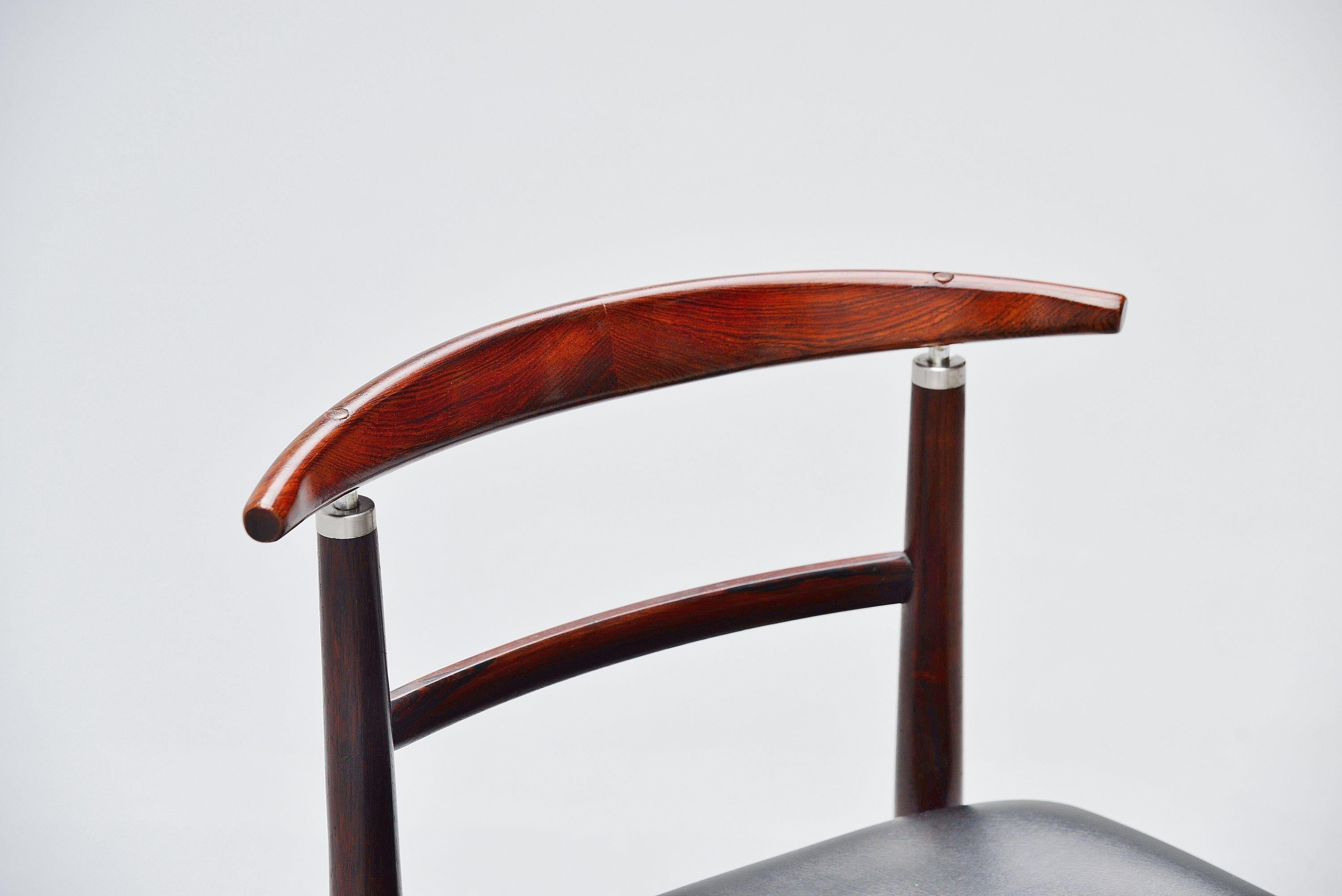 Nice sculptural chair model 465 designed by designer duo Helge Sibast and Borge Rammeskov and manufactured by Sibast Mobler, Denmark, 1962. This chair has a solid rosewood frame and black leatherette upholstery. The chair is great to use as a desk