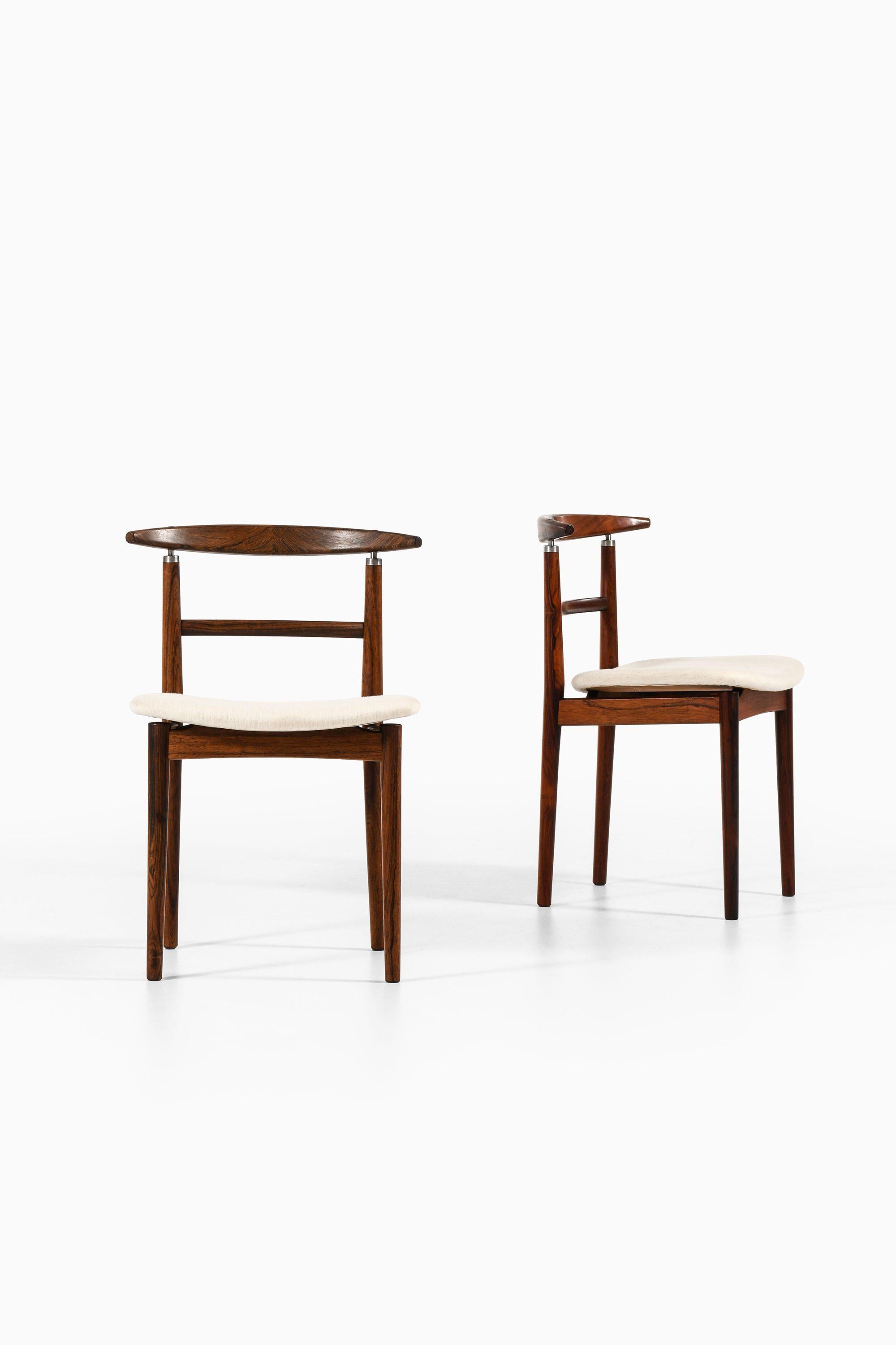 Set of 8 Dining Chairs in Rosewood by Helge Sibast & Børge Rammeskov, 1962

Additional Information:
Material: Rosewood and reupholstered in Gabriel Savak plain (by Tove Kindt Larsen)
Style: Mid century, Scandinavian
Rare set of 8 dining chairs model