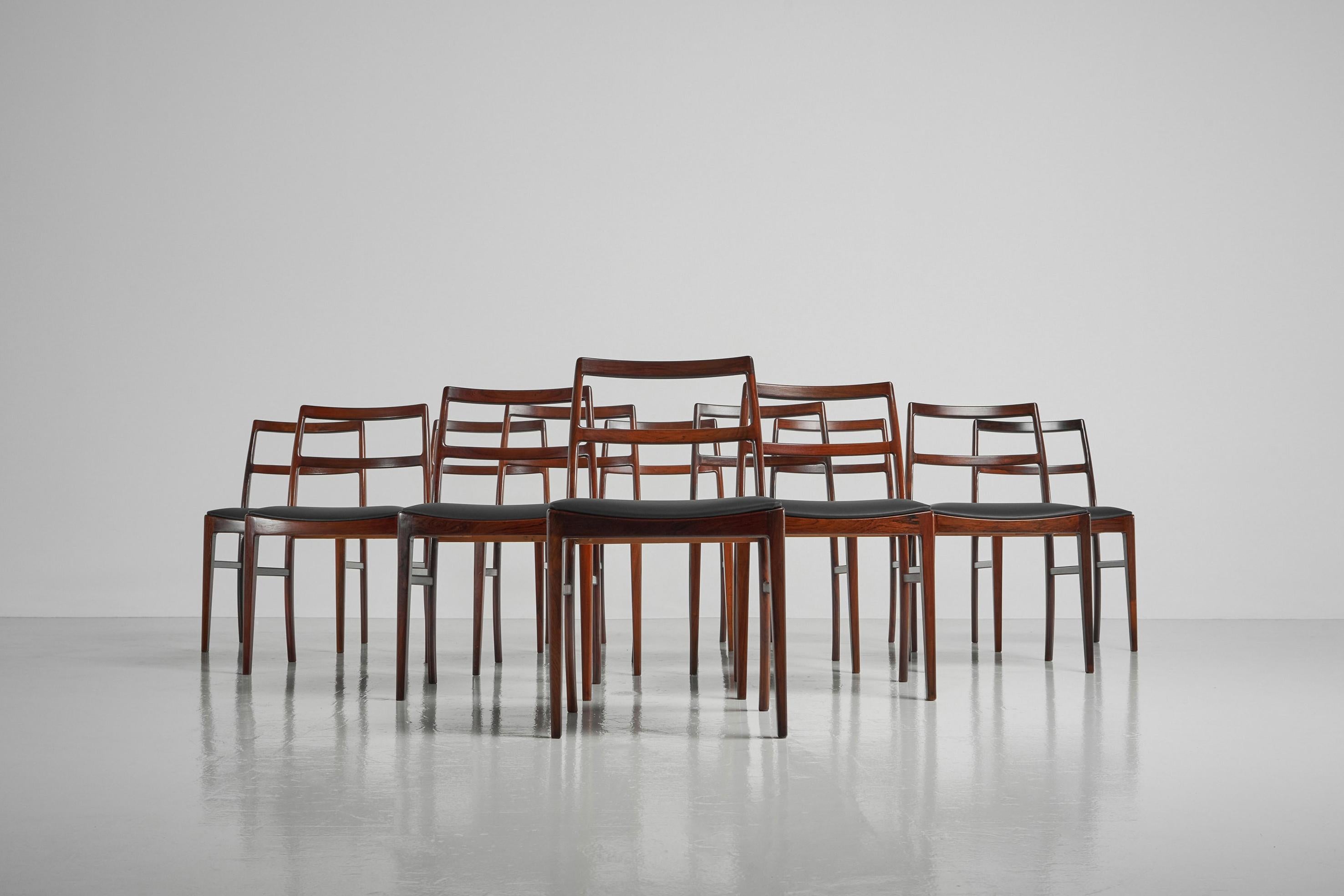 Fantastic large set of 12 dining chairs model 430 designed by Helge Sibast for Sibast Mobler, Denmark 1960. These elegant dining chairs are made of solid rosewood, and they are newly upholstered in black leather of high quality by Hulshoff. The
