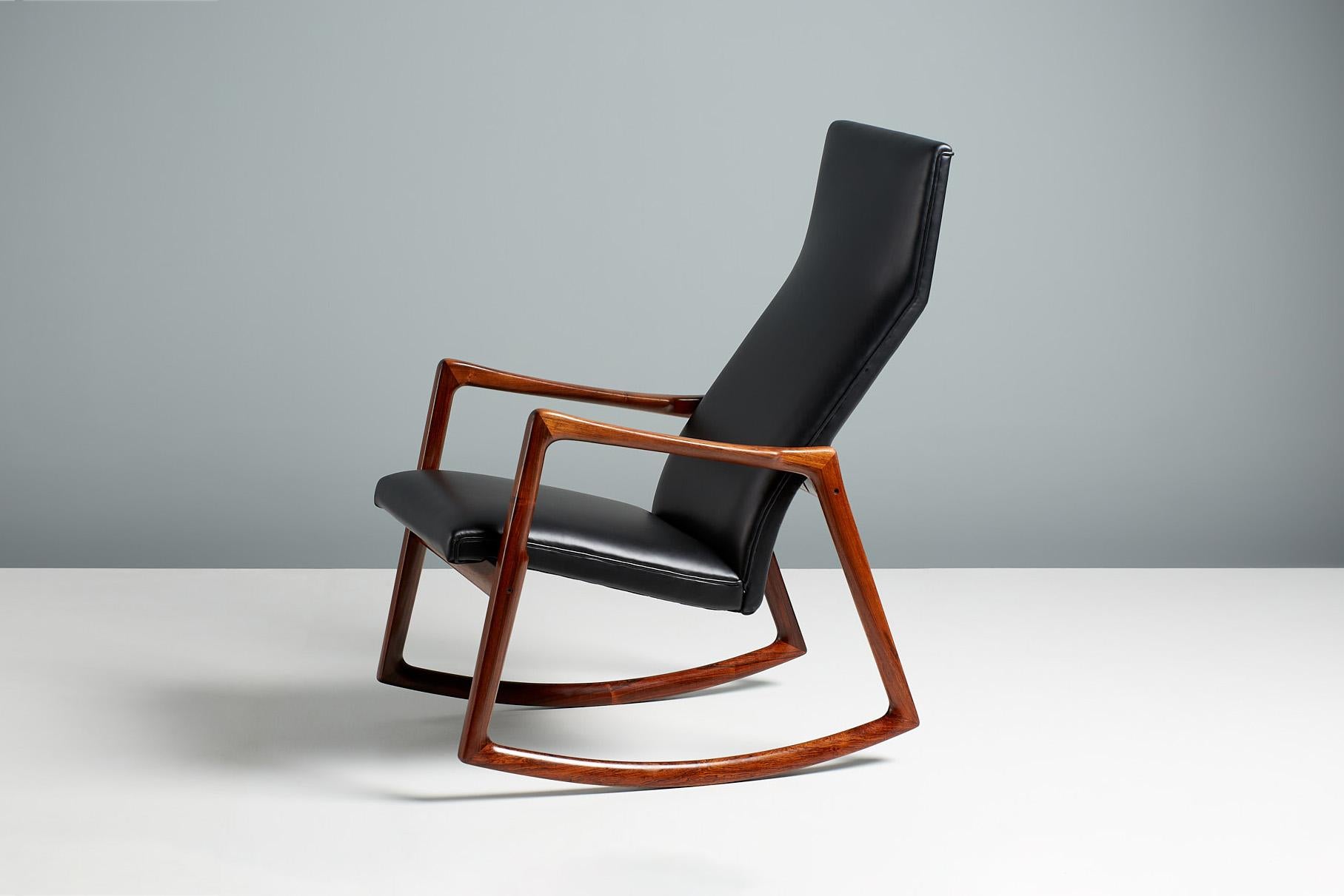 Helge Vestergaard-Jensen rosewood rocking chair, c1960s.

Stunning sculptural, modernist rocking chair attributed to Danish master Helge Vestergaard-Jensen and supposedly produced by his long-time collaborator Peder Pedersen. 

This later