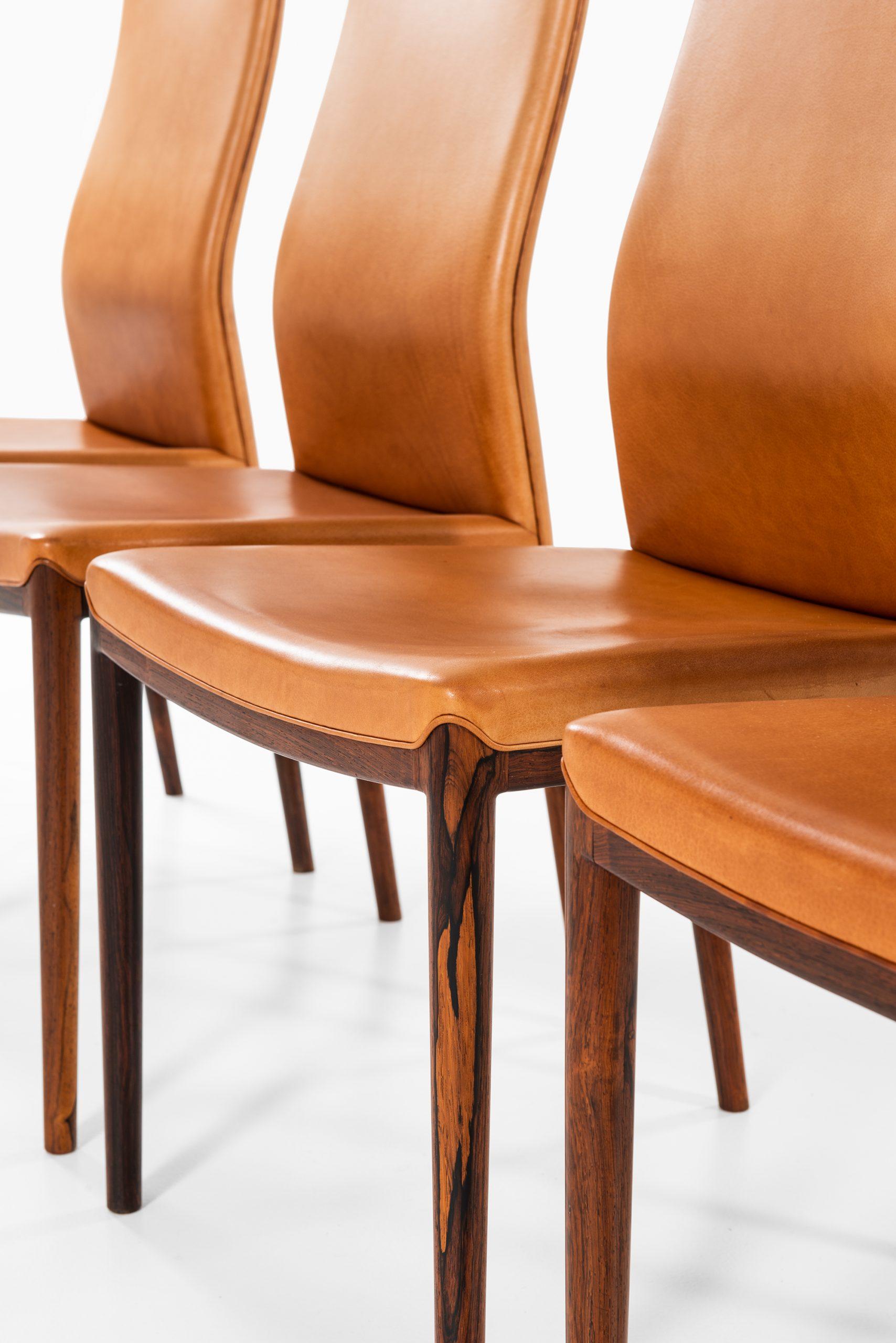 Rarísimo conjunto de 8 sillas de comedor diseñadas por Helge Vestergaard Jensen. Producido por P. Jensen & Co. Ebanistas en Dinamarca.