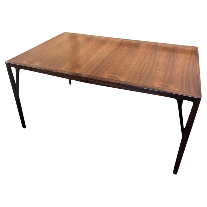 This table is 270cm long when extended and 150cm long without extensions. The width is 100cm. The height is 77cm. 

Unlike the table made by Sigh and Sonner that I have listed separately on 1stdibs, which is often attributed to Helge Vestergaard