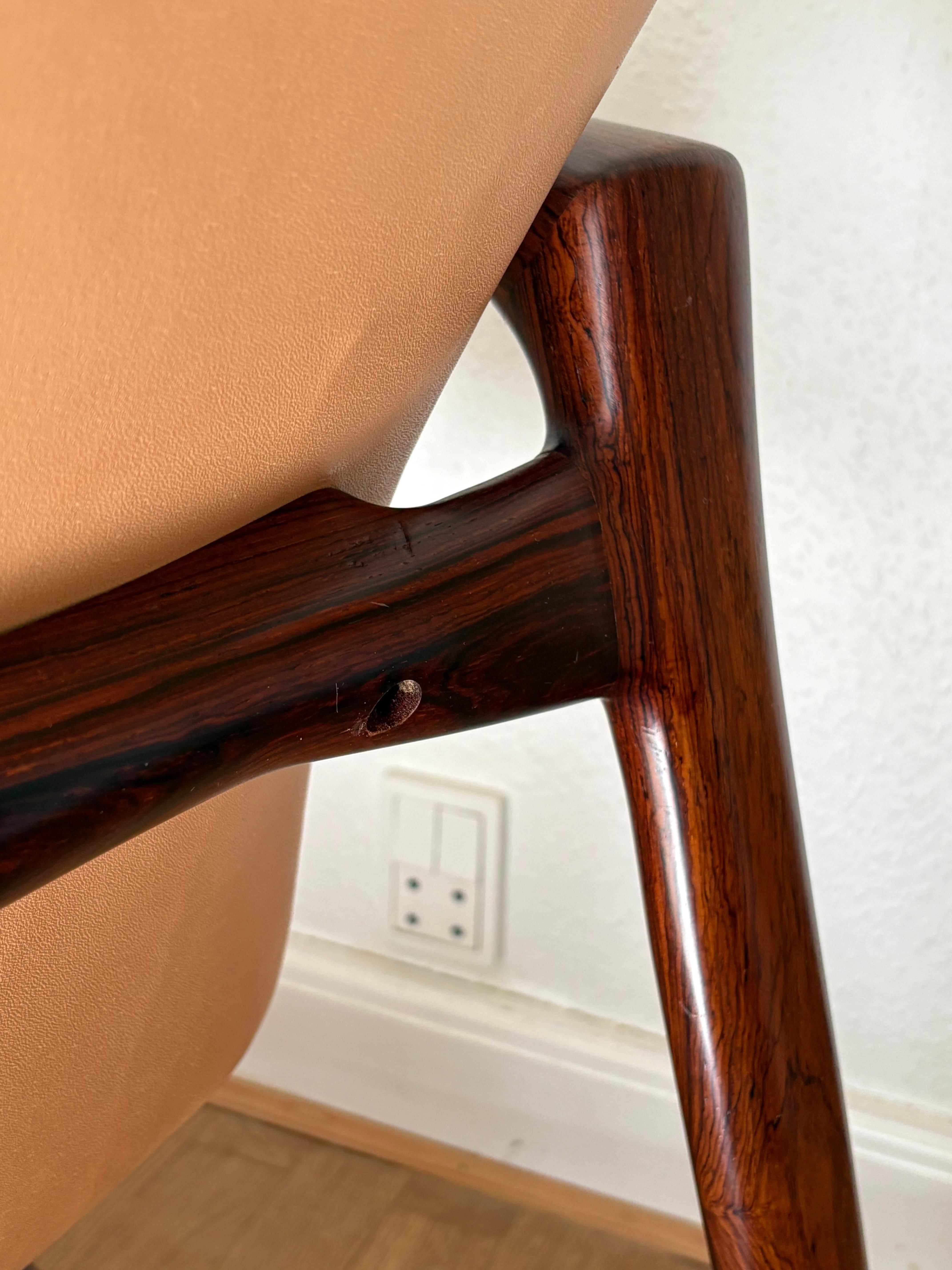 Designed in 1959 by Helge Vestergaard-Jensen, this rosewood edition was made by the Niels Roth Andersen,  Alderman of the Copenhagen Guild of Furniture Makers from the mid-90s until his retirement in 2016. 

Made of the most amazingly figured