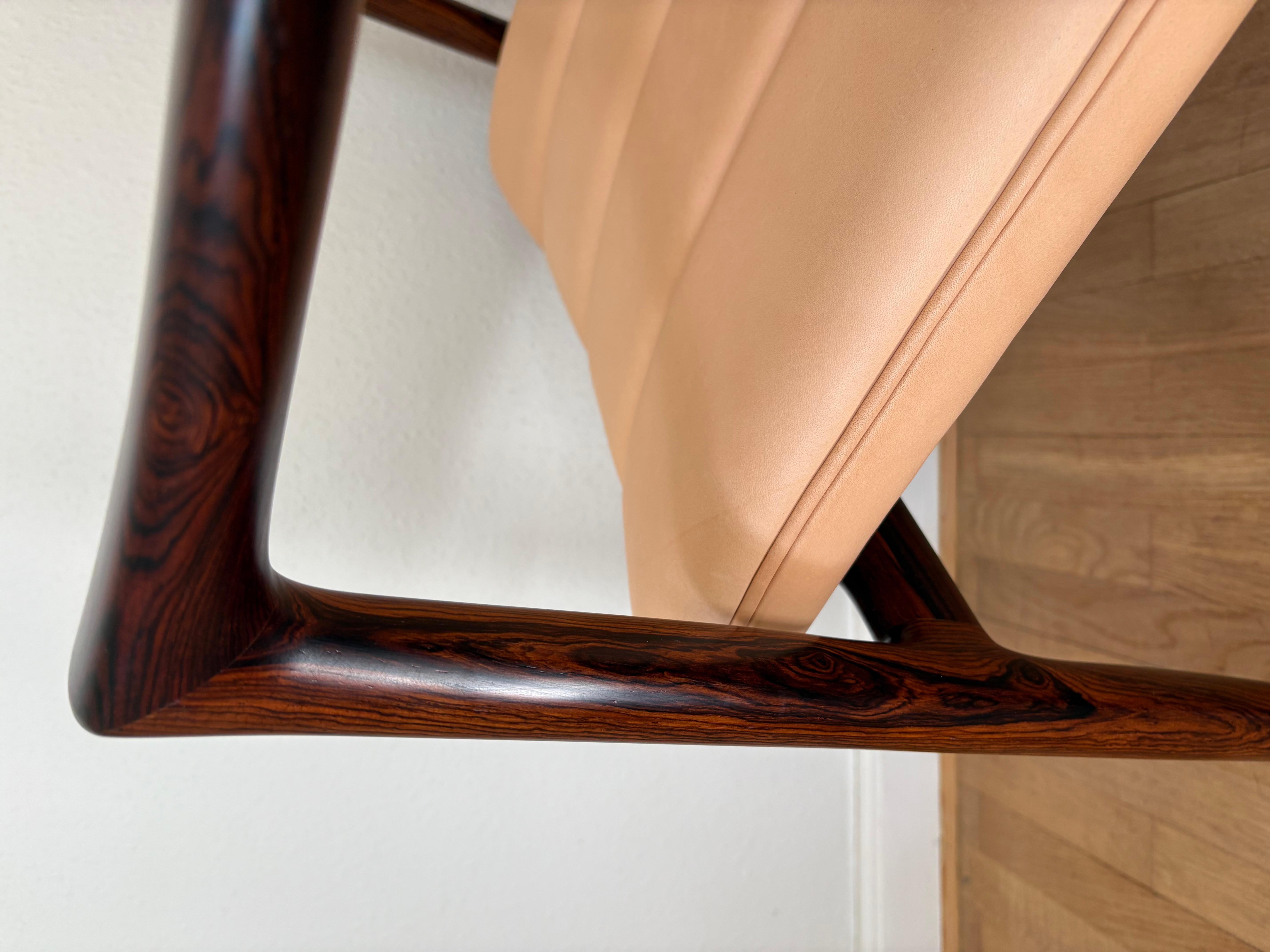 Hardwood Helge Vestergaard Jensen Rosewood Rocking Chair designed 1959 For Sale
